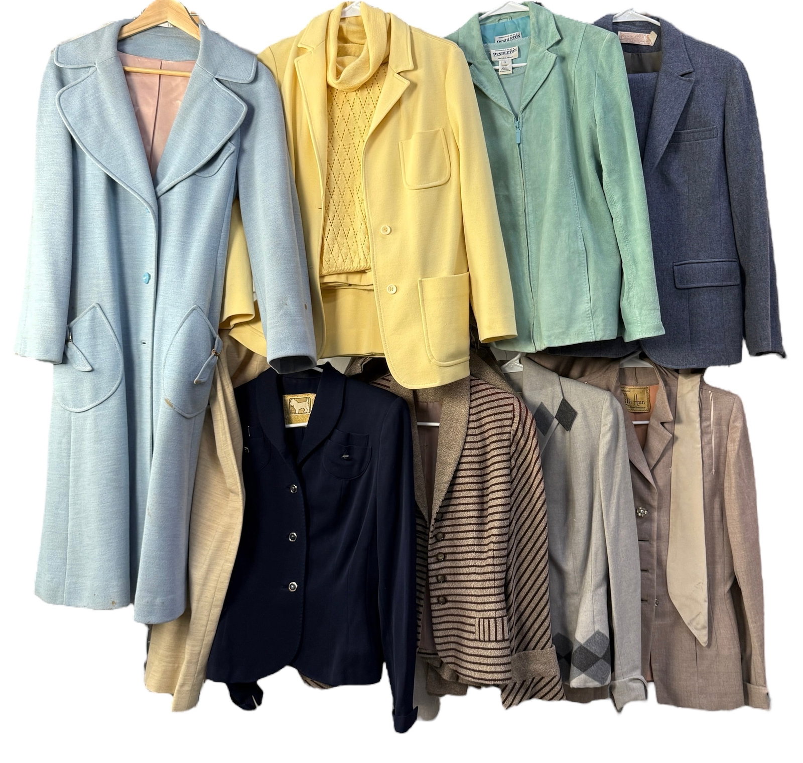 Group Of Vintage Women's Clothing Inc Lilli Ann: Includes one Pendleton suit, suede jacket, and sweater; one Rothmoor jacket; one Betty Rose coat; three Act III pieces; one Lilli Ann jacket and one Lilli Ann skirt suit; one Smirafe skirt suit; and