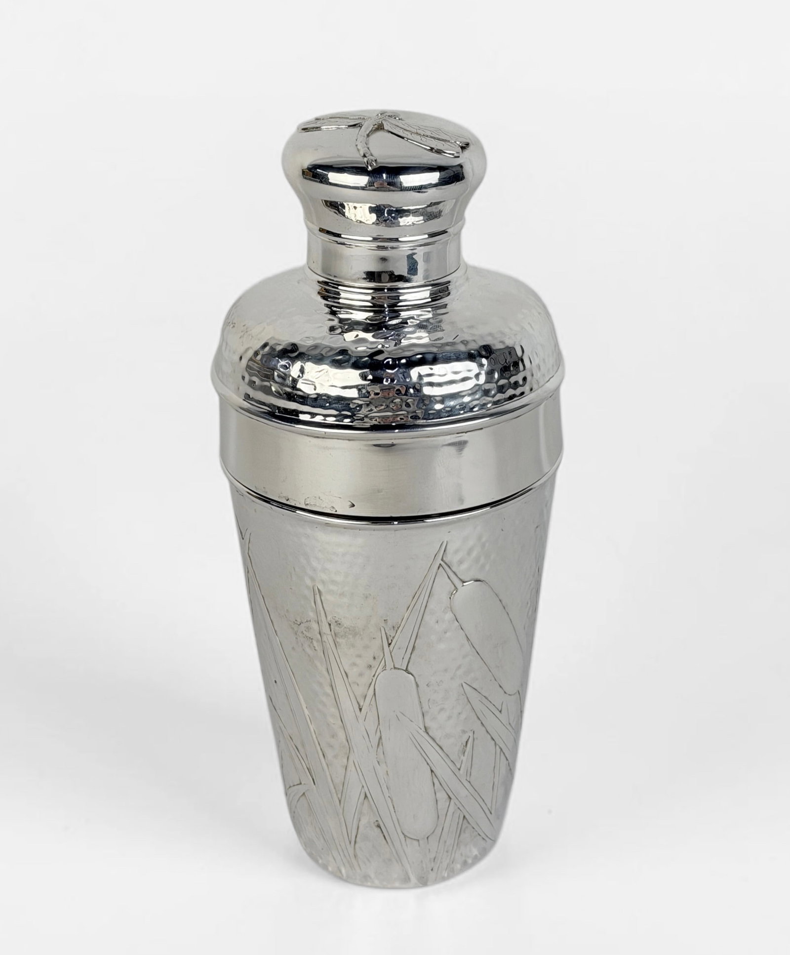 Tiffany & Co Sterling "Cattails" Cocktail Shaker: Features a dragonfly on the lid & cattails along the side. Total Weight: 15.57ozt Dimensions: 8" Tall x 3 1/2" Diameter at Widest Point Condition: Some surface marks. 