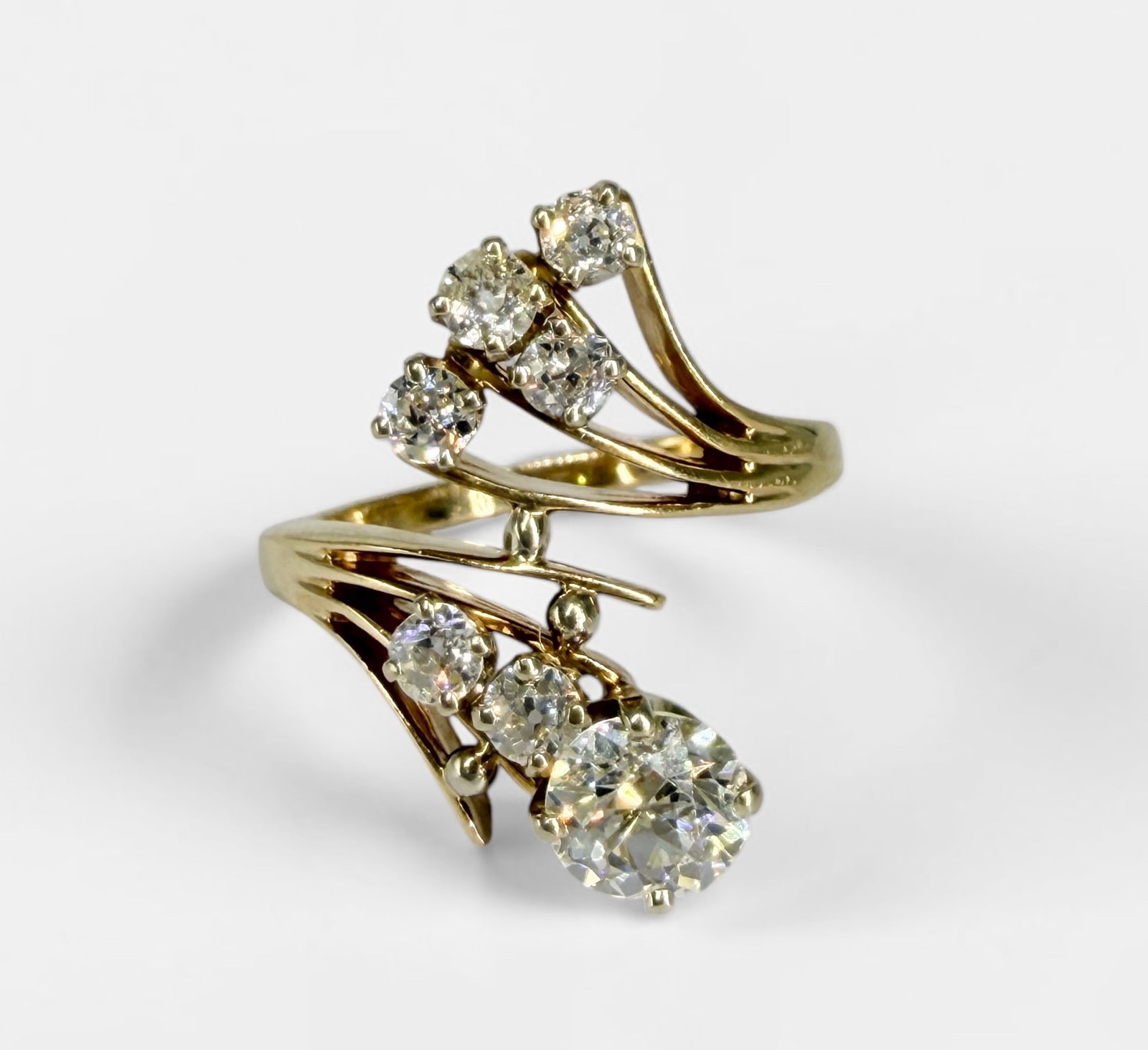 1 Carat Diamond Ladies Cocktail Ring: Size: 8 1/4 Total Weight: 6.2g Per Appraisal: One ladies stamped 14k yellow gold and diamond fashion ring. The ring contains one main European cut diamond which measures 6.39 x 6.34 x 4.14