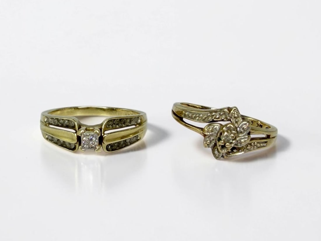 (2) 10K Gold Diamond Ladies Rings: Size: 7 each Weight: 4.7g Condition: Good