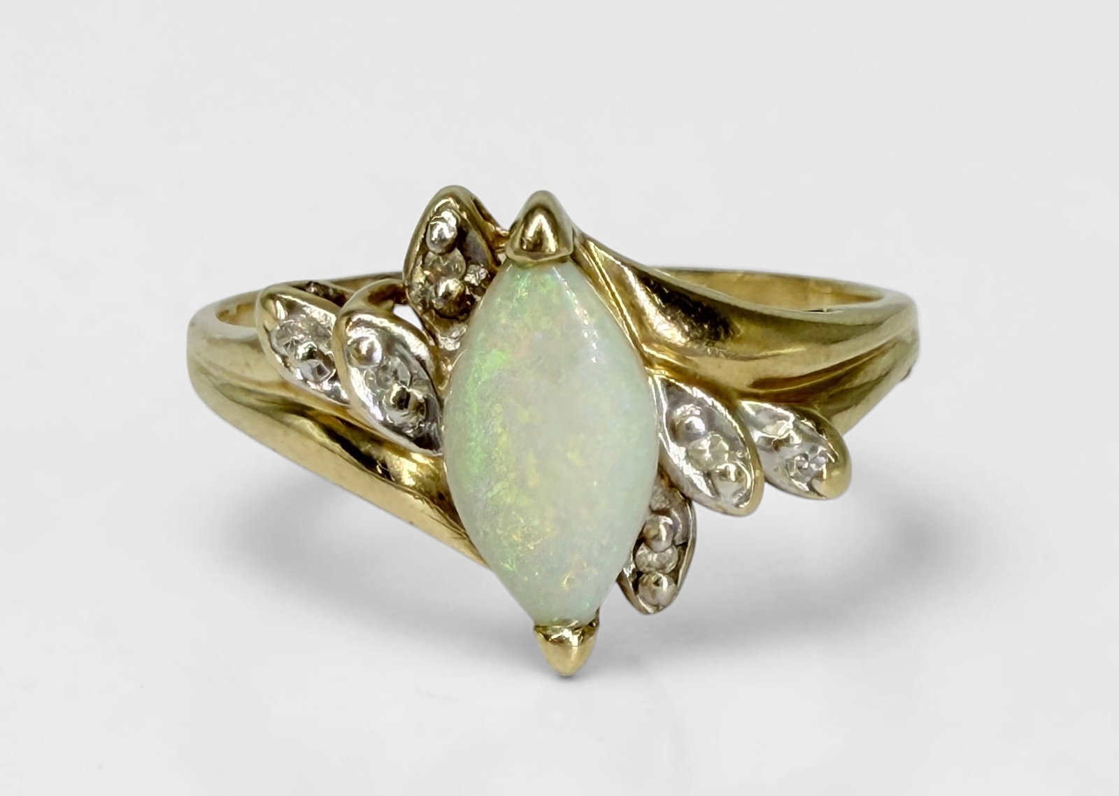 14K Gold Opal Diamond Ladies Ring: Size: 8 1/2 Weight: 2.4g Opal: 10mm x 5mm Condition: Good