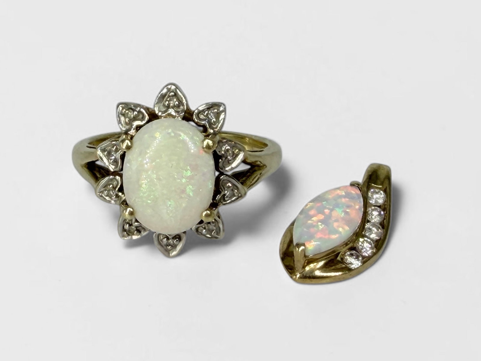 10K Gold Opal & Diamond Ring & Pendant: Ring Size: 7 Total Weight: 4.59g Dimensions: 17mm x 8mm pendant Condition: Both pieces are in good condition.