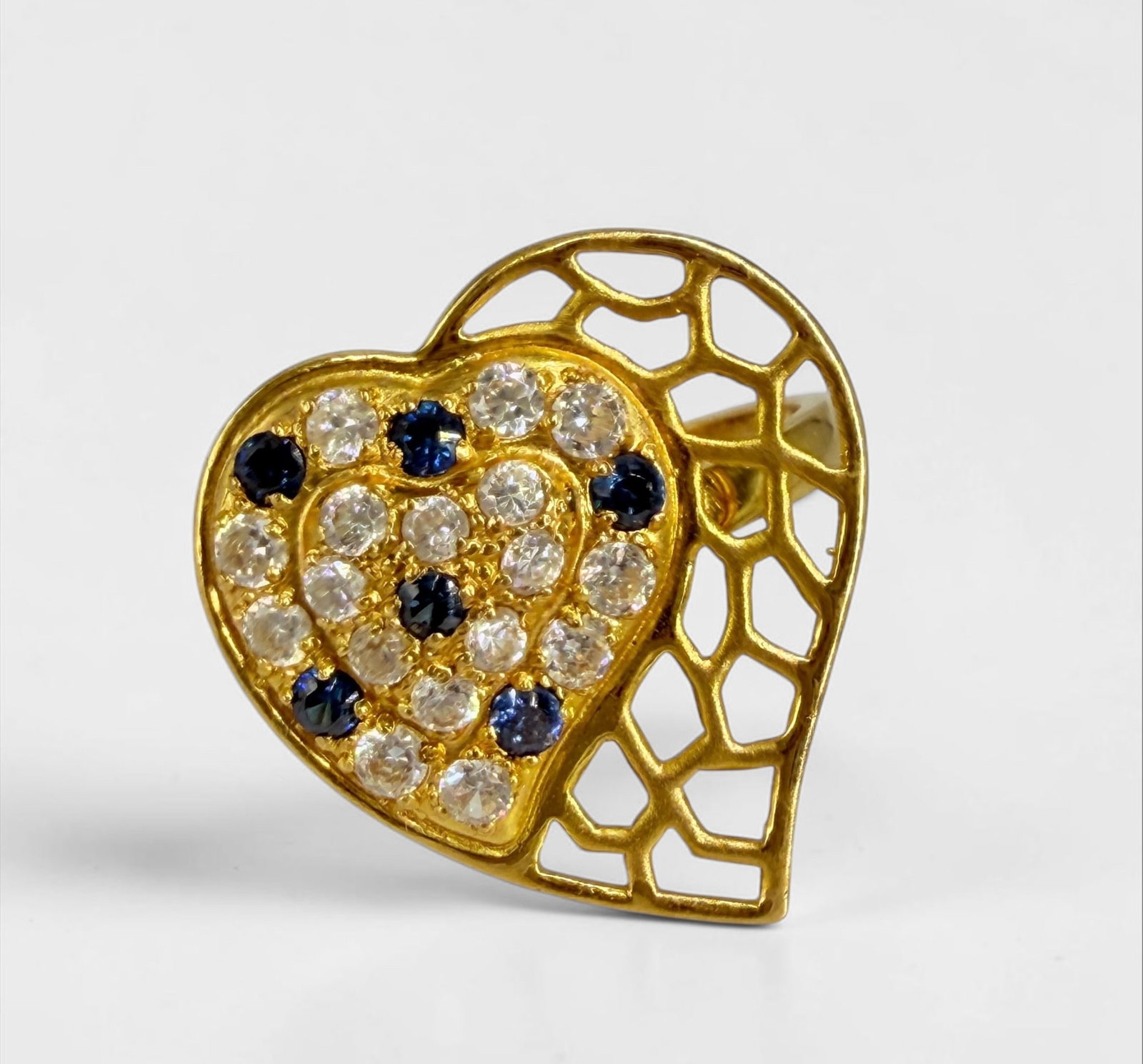 21K Gold Heart Ring With Blue and White Stones: Size: 9 3/4 Total Weight: 3.6g Dimensions: 3/4" Setting Condition: The ring is in good condition. 