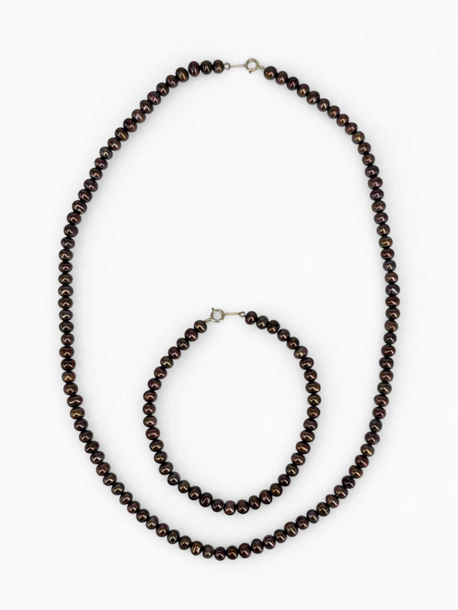 Brown Pearl & 10K Gold Necklace & Bracelet: Total Weight: 23.26g Length: 18" Long Necklace, 7" Long Necklace Condition: In good condition. 