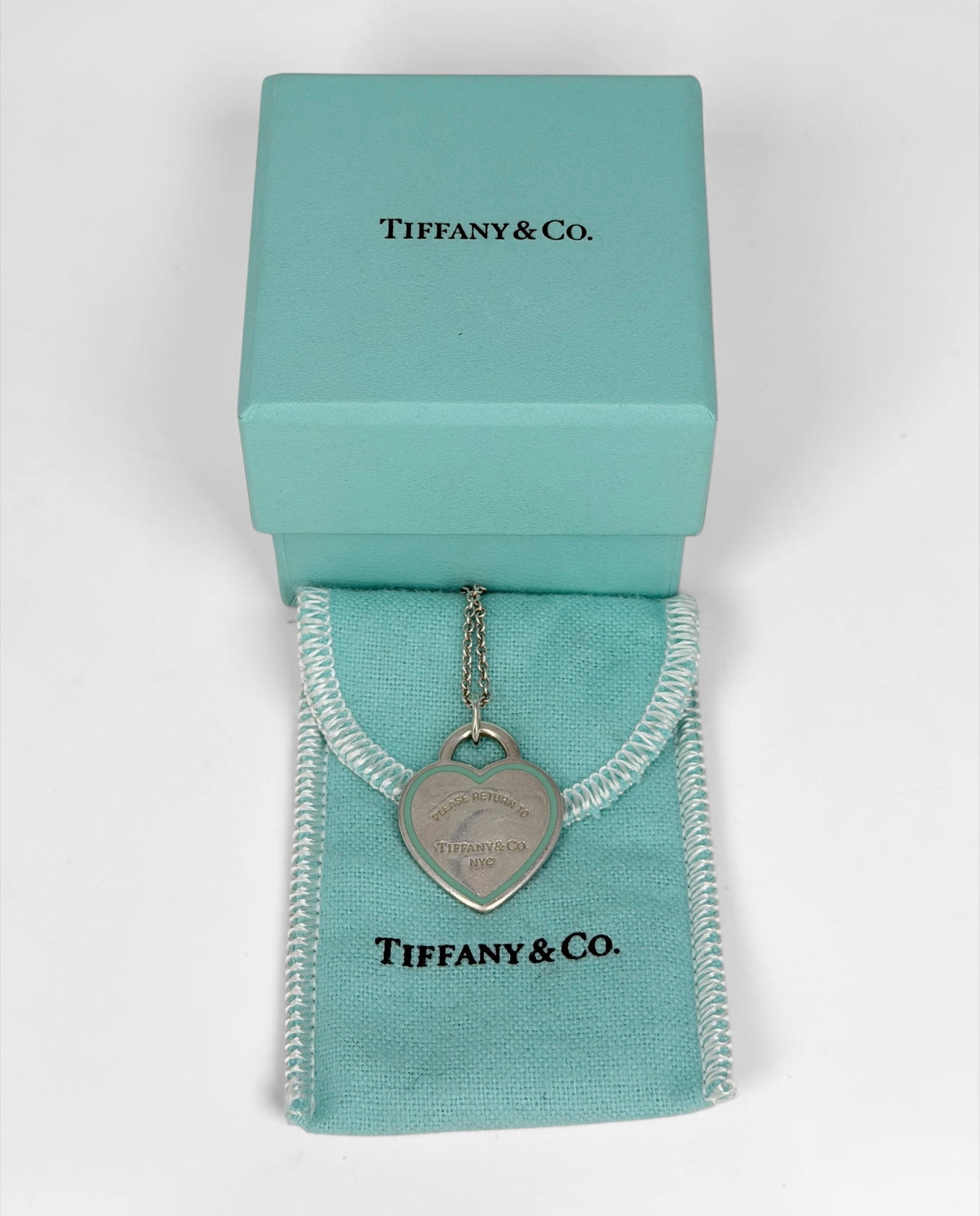 Tiffany & Co Sterling Silver Necklace W/ Heart Pendant: Length Of Necklace: 18" Length Of Pendant: 1" Condition: Very Good and comes in a Tiffany box