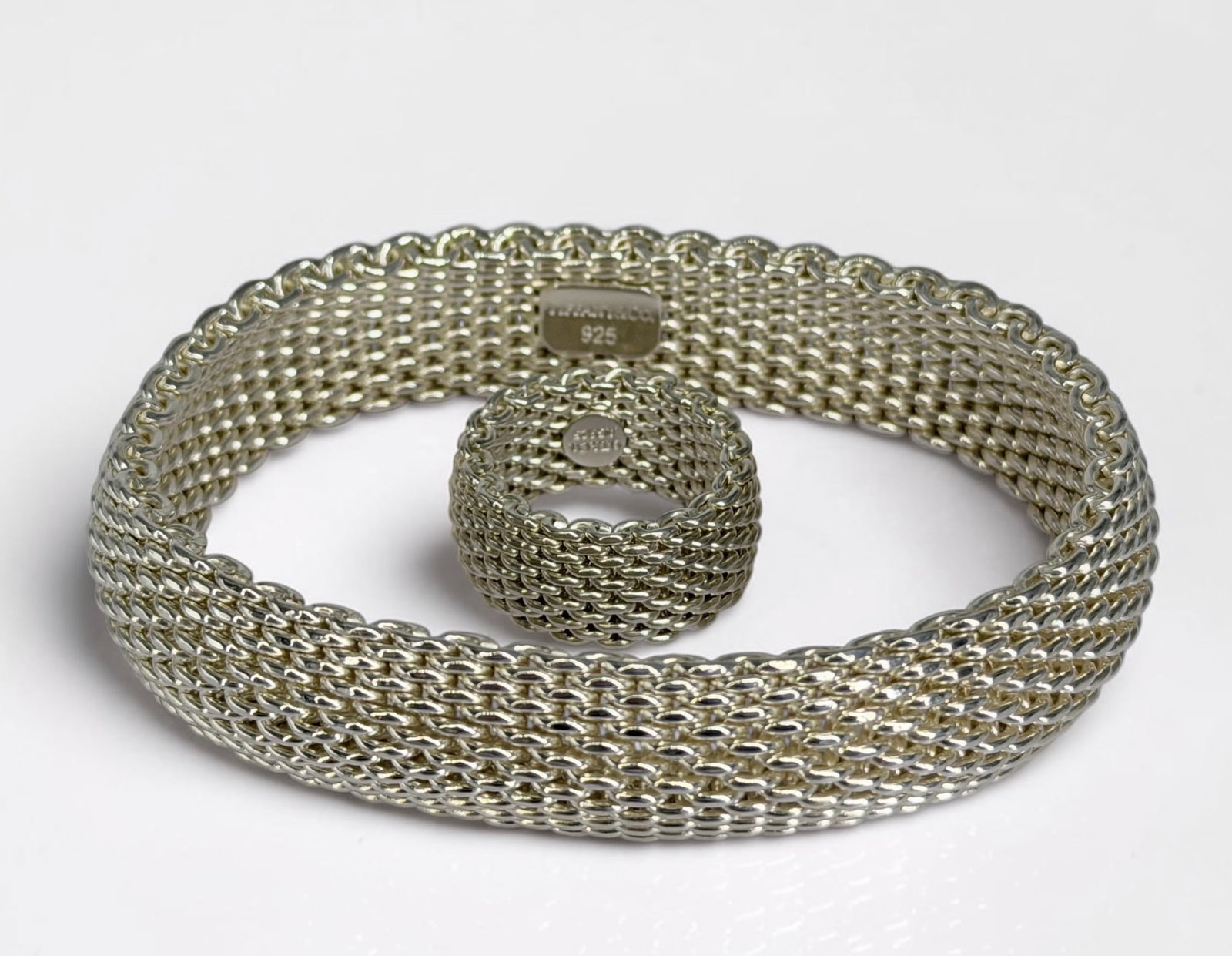 Tiffany & Co Sterling Silver Mesh Bracelet and Ring: Each comes in a Tiffany box with a pouch Ring Size: 6 1/2 Bracelet: Approximately 8" Condition: Very Good with very little evidence of wear, like new
