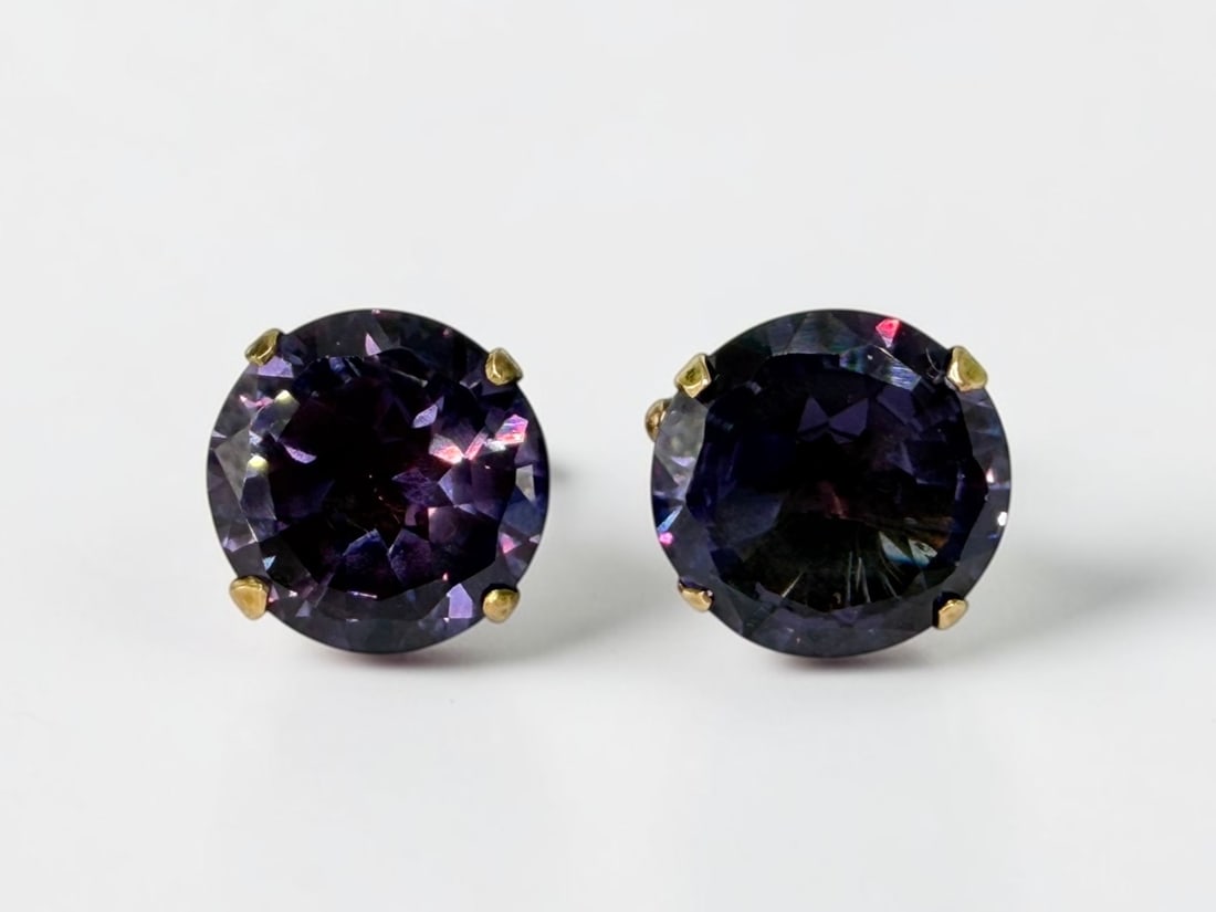 14K & Purple Synthetic Alexandrite Cufflinks: Total Weight: 19.36g Dimensions: 1" Tall x 3/4" Wide Condition: Some wear to the gold. The stones have light surface marks consistent with wear. 