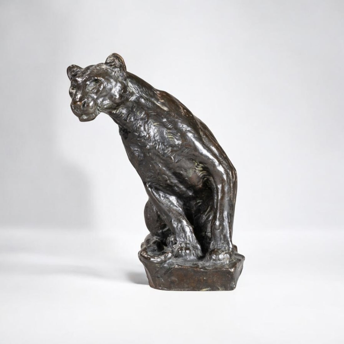 Roger Godchaux “Lionne A L'Affut" Bronze Sculpture: Signed and inscribed along the base. Dimensions: 8" x 5" x 6" Condition: The sculpture is in good condition. Artist Bio: Roger Godchaux (1878–1958) was a French animalier sculptor and painter wh