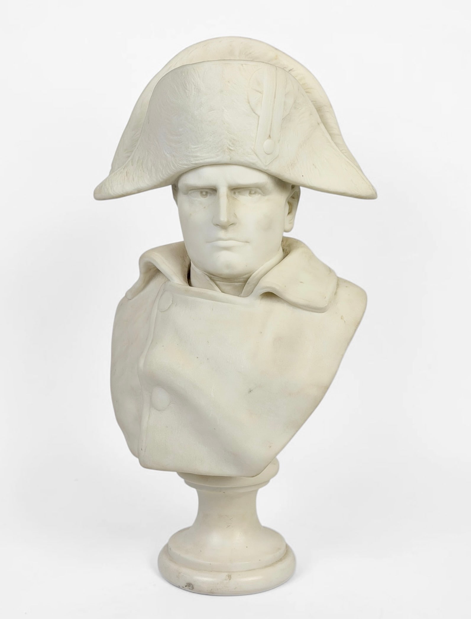 Antonio Piazza “Napoleon" Marble Bust: Signed on verso. Dimensions: 20" x 10 1/2" x 6" Condition: Light wear throughout, consistent with age. Overall, the sculpture is in good condition.