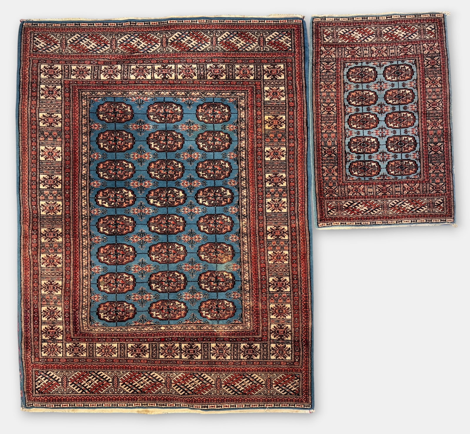 Set of (2) Turkmen Rug (A): Dimensions: 96" x 51" Largest Rug Condition: There are a few stains throughout. Colors appear bright and vibrant. 