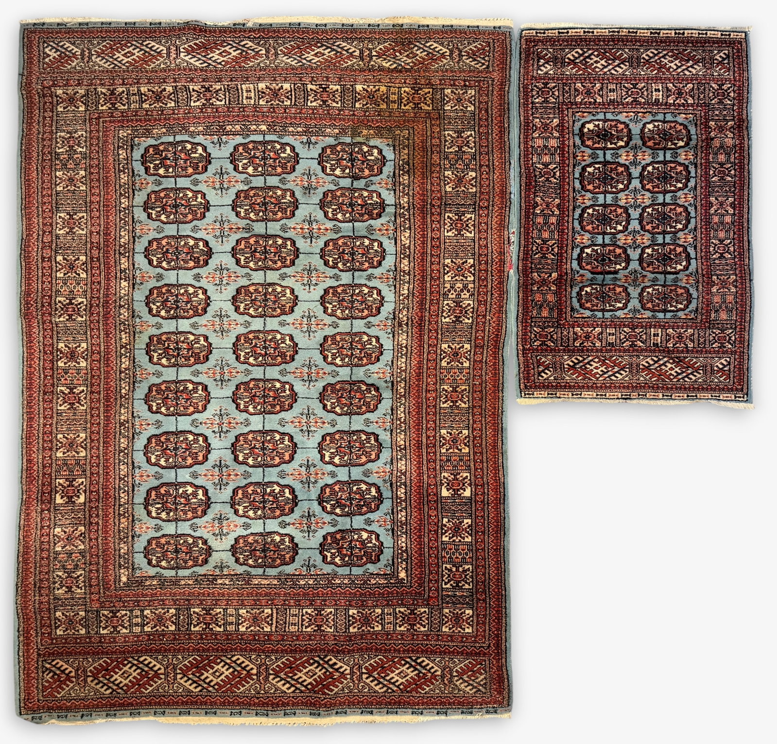Set of (2) Turkmen Rug (B): Dimensions: 96" x 51" Largest Rug Condition: There are a few stains throughout. Colors appear bright and vibrant. 
