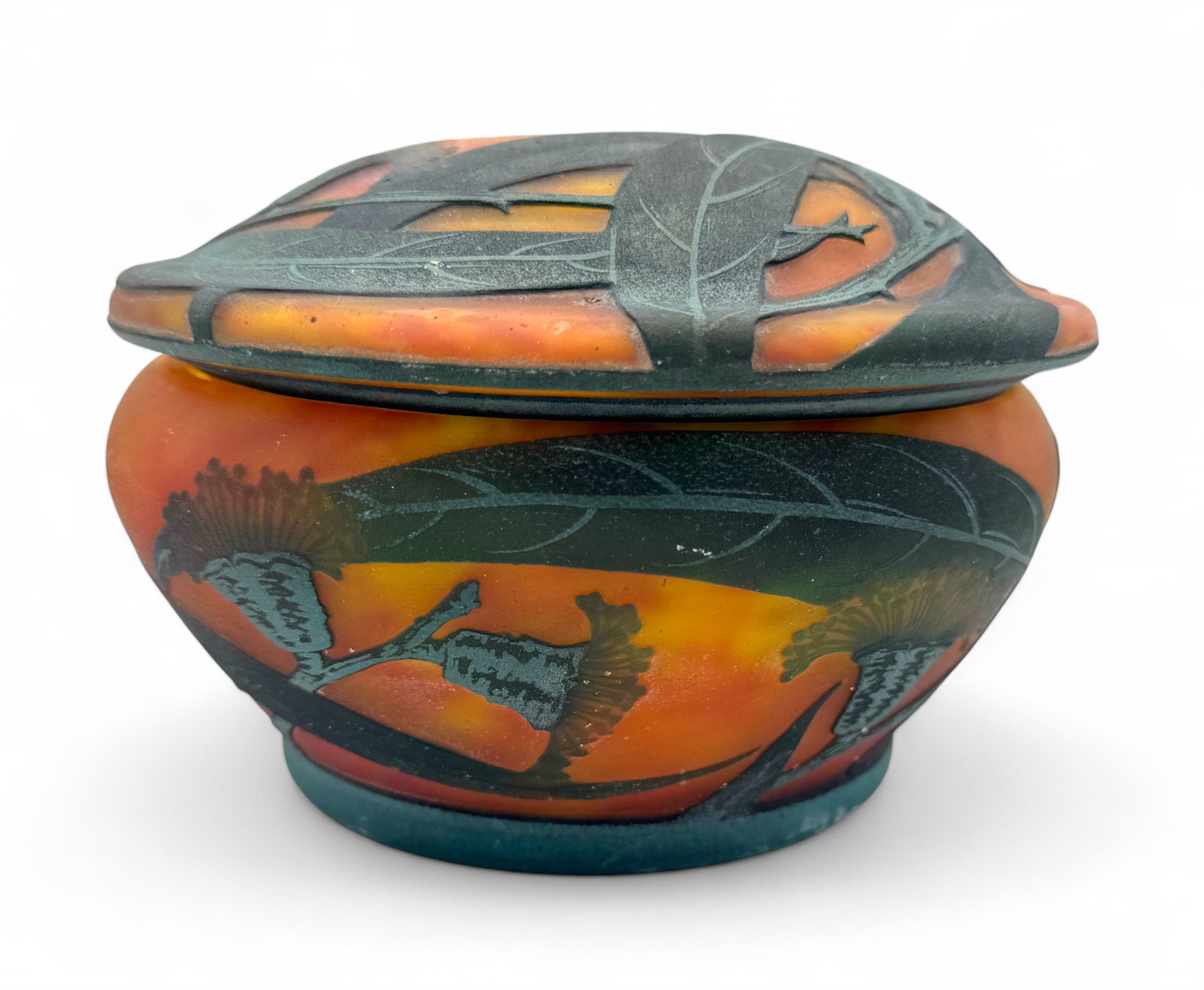 Nancy Daum Cameo Lidded Bowl: Gold & red cameo glass with a black frosted flower pattern. Signed "Daum, Nancy" Dimension: 5 1/2" diameter Condition: Very good, no chips or cracks