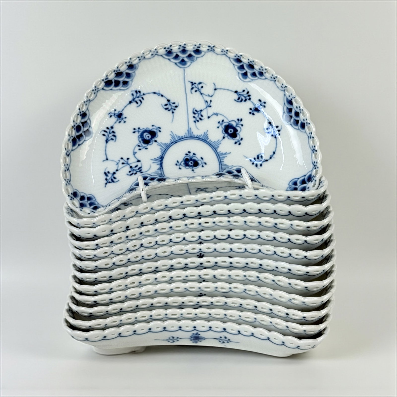 (12pc) Royal Copenhagen Blue Fluted Full Lace Crescent Dishes: Size: 8 1/4"L x 4 3/4"W Condition: Very good condition with minimal wear, no chips or cracks.