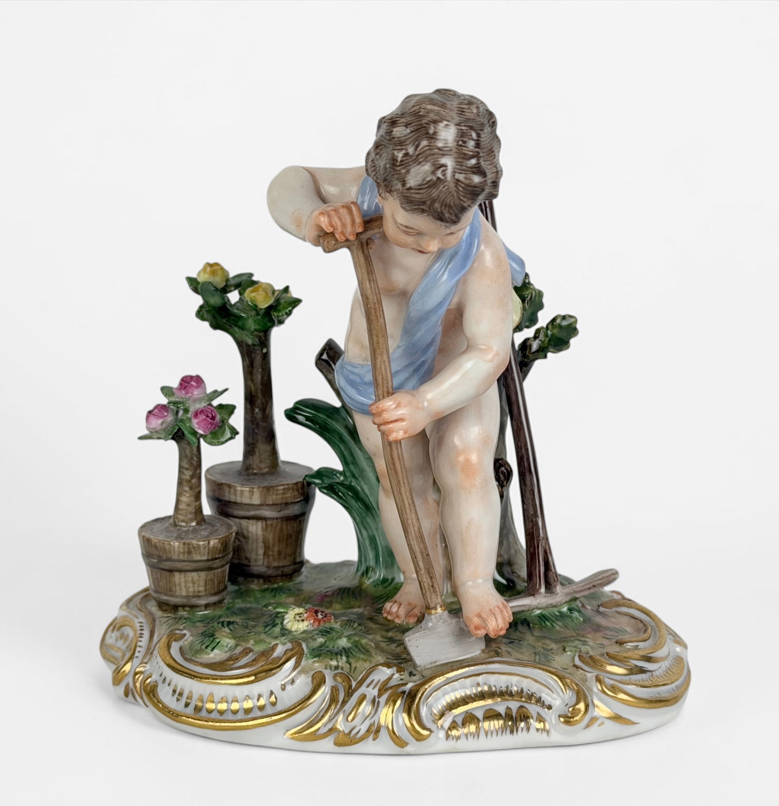 19th C. Meissen "Cherub Gardener" Porcelain Figure: Dimensions: 4 1/2" x 5" Condition: Light wear to the bottom. Minor repair to the flowers in the pot. Overall, the figure is in good condition. 