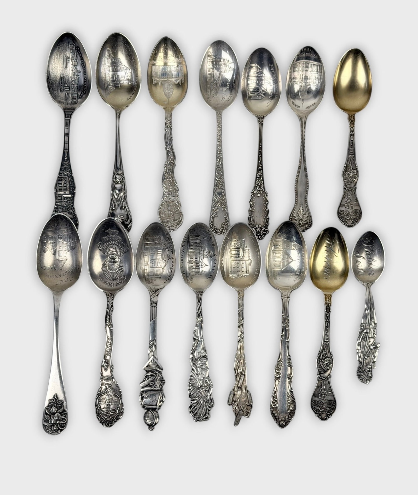 Sterling Silver Iowa State Collectible Spoons: Length: Approx. 6" with various sizes Weight: 9ozt Condition: Minor tarnishing throughout. Minor surface scratches. Some have monograms.