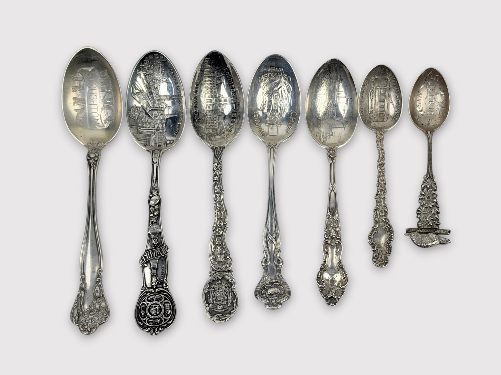 Sterling Silver Wisconsin State Collectible Spoons: Length: approx. 6" long with various sizes Total Weight: 3.9ozt Condition: Minor tarnishing and surface scratches throughout. One spoon monogrammed with a date.