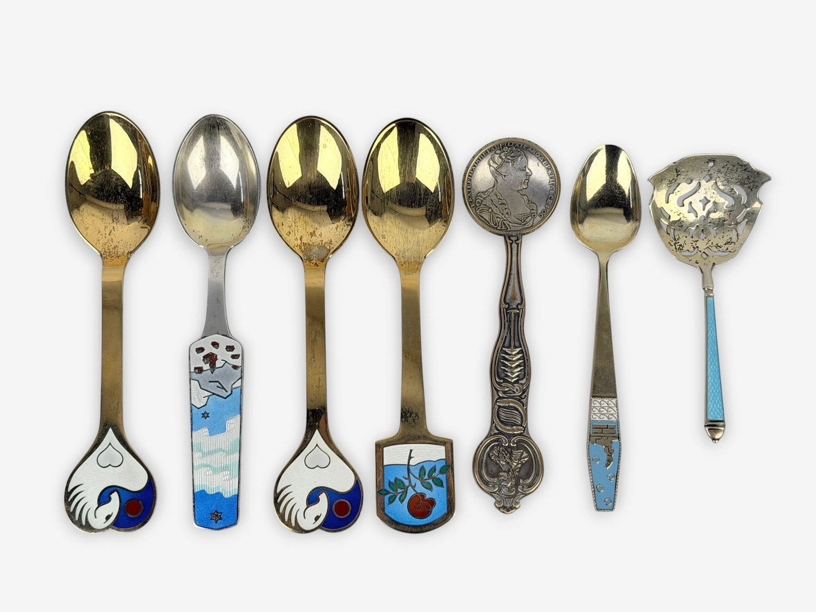 Group of Anton Michelsen .840 Silver Danish Christmas Spoons: Length: Longest Spoon 6 1/2" Long Total Weight: 9.5ozt Condition: One spoon comes in the original box with paperwork. Minor tarnishing and surface scratches throughout. 