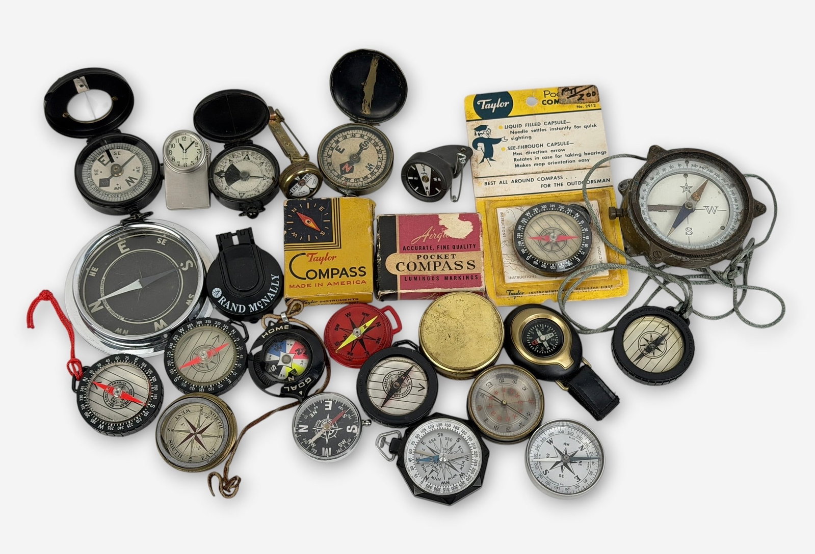 Group of (25) Various Compasses (L): Size: 2" Diameter Condition: Mixed condition throughout with wear, tarnish, scratches, and scattered oxidation from age and use. Working but untested for accuracy. Please refer to the phot