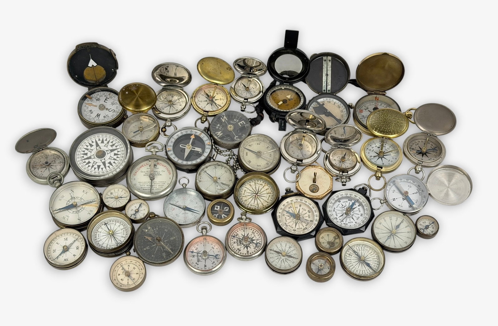 Group of (40) Various Compasses (P): Size: 2" Diameter Condition: Mixed condition throughout with wear, tarnish, scratches, and scattered oxidation from age and use. Working but untested for accuracy. Please refer to the phot