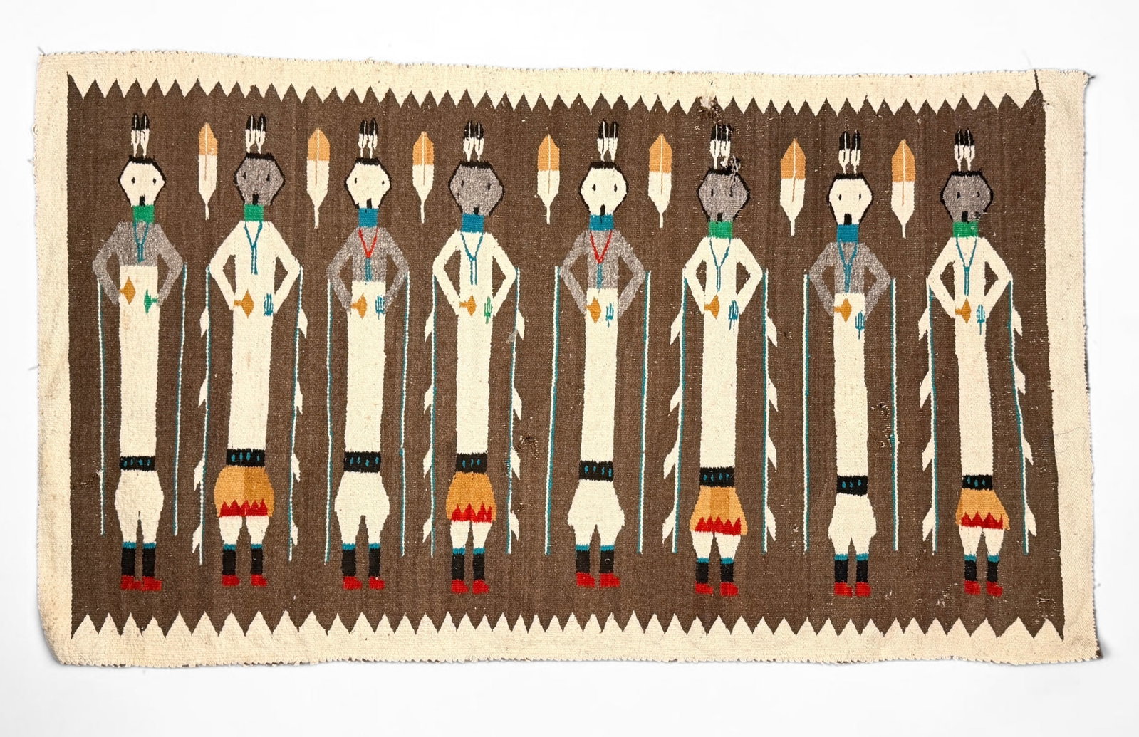 Handwoven Navajo Yei Wool Rug: Dimensions: 35" Wide x 62" Long Condition: Small holes throughout the rug and minor staining throughout. The colors are bright and vibrant. Please see images for details. 