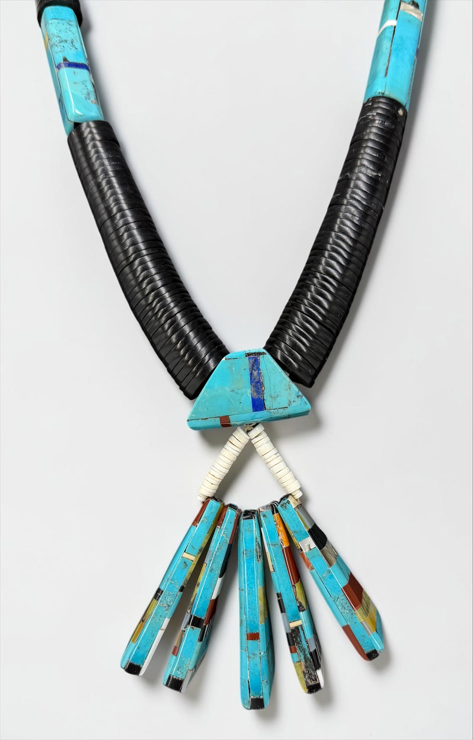 Southwestern-Style Turquoise Native American Necklace: Total Weight: 261.7g Length: 31" Pendant: 4" x 3 1/2" Condition: The necklace is in good condition. 