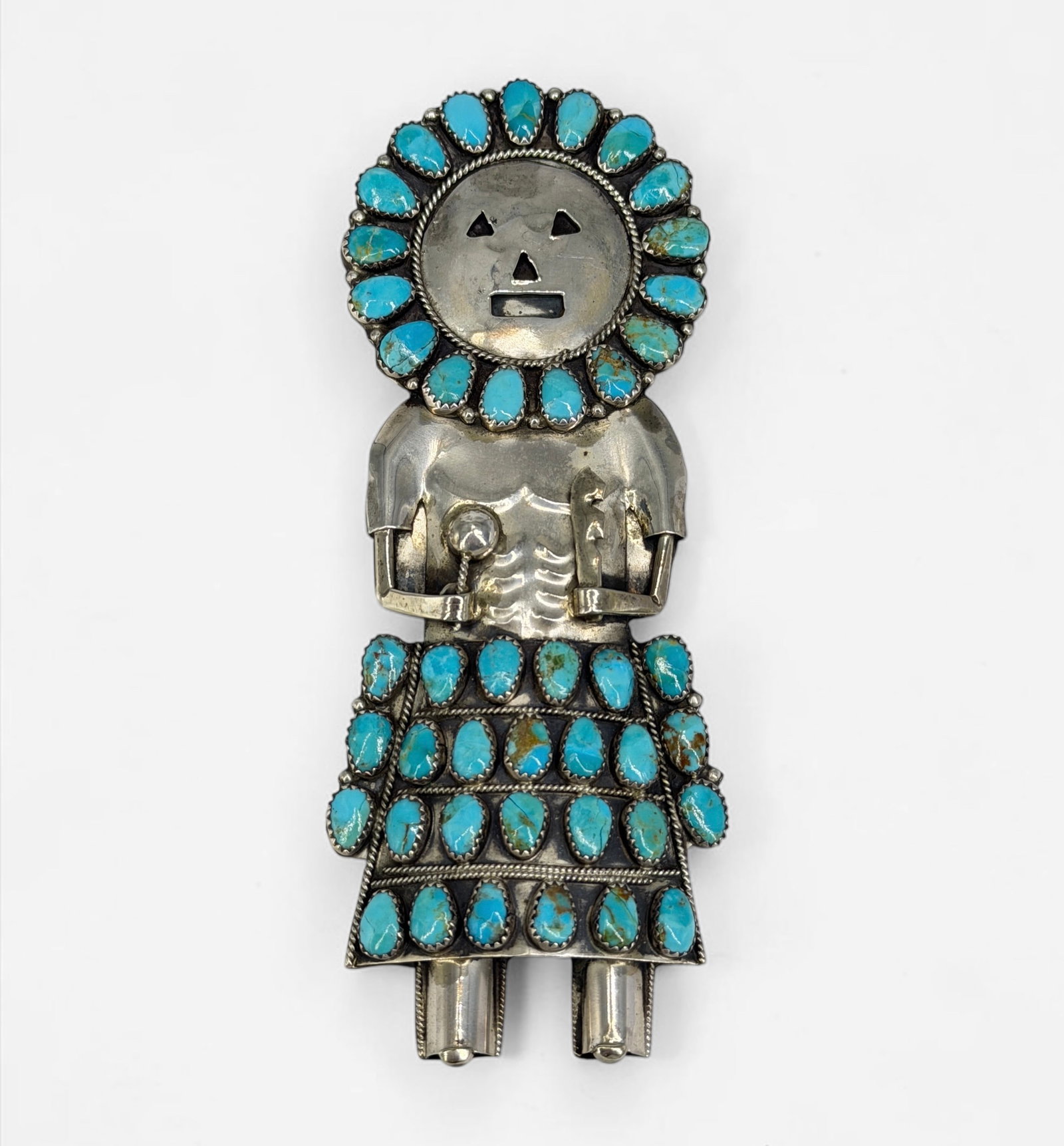 Gerald Mitchell Navajo Sterling Silver & Turquoise Kachina Brooch: Stamped on the reverse. Dimensions: 5" x 2" Total Weight: 48.2g Condition: The brooch is in good condition. 