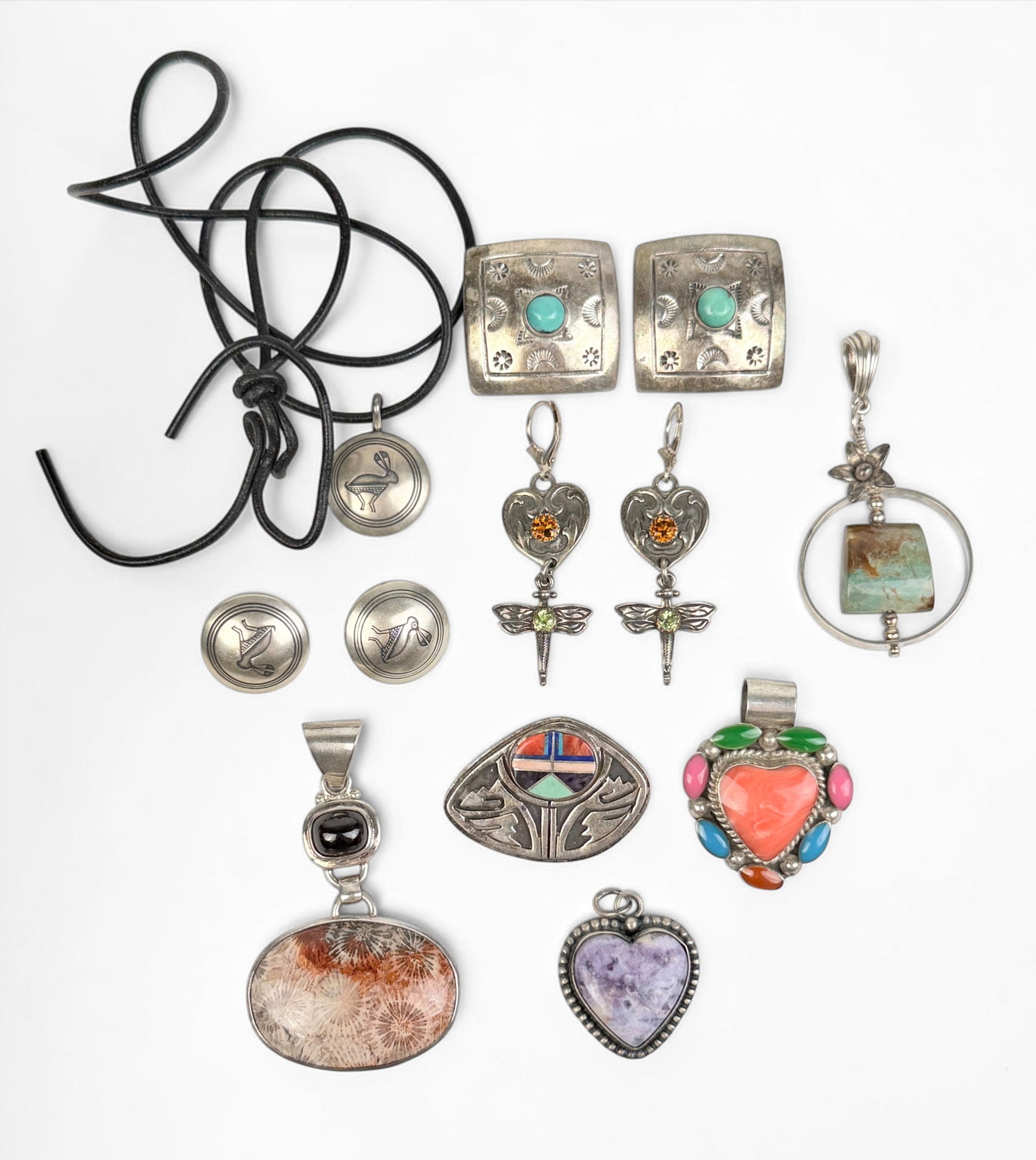 Group of Navajo Sterling Jewelry: Total Weight: 103g Condition: Minor tarnishing throughout. See images for details. 