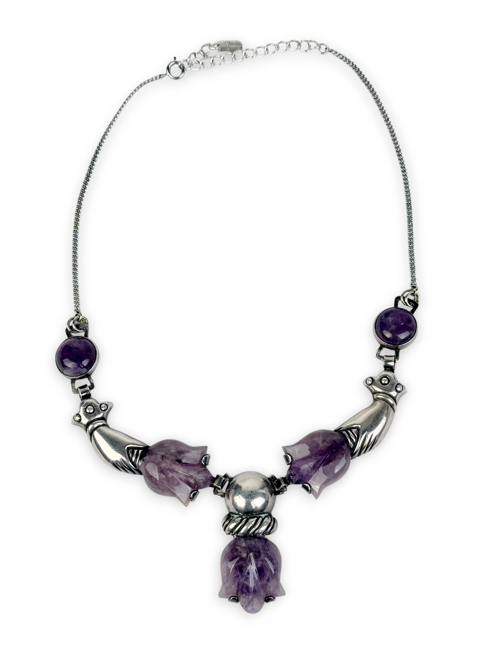 William Spratling Sterling Silver & Amethyst Necklace: Length: 16" Pendant: 1" Wide x 2" Tall Total Weight: 60.4g Condition: Surface scratches to the silver. Overall, the necklace is in good condition. Artist