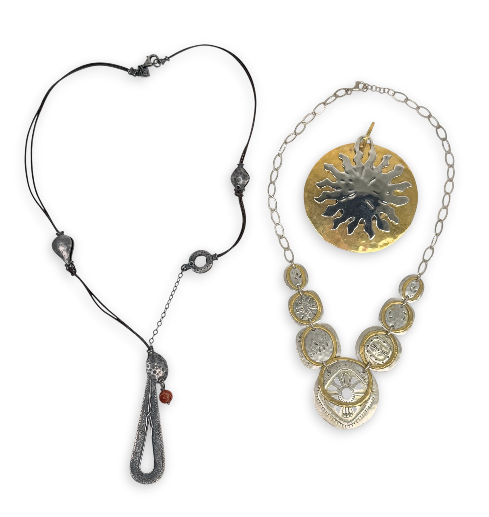 (3) Artisan Sterling Jewelry Works: The lot includes (2) necklaces and (1) large pendant. Longest Length: 22" Long Cord & 3" Long Pendant Total Weight: 96.7g Condition: The pieces are in goo