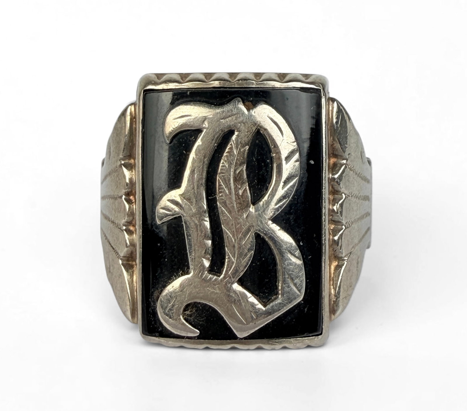 10K White Gold "B" Mens Signet Ring: Size: 11 Total Weight: 6.4g Dimensions: 1/2" Wide x 3/4" Tall Setting Condition: Minor scratches consistent with gentle wear. Otherwise, the ring is in good condition.
