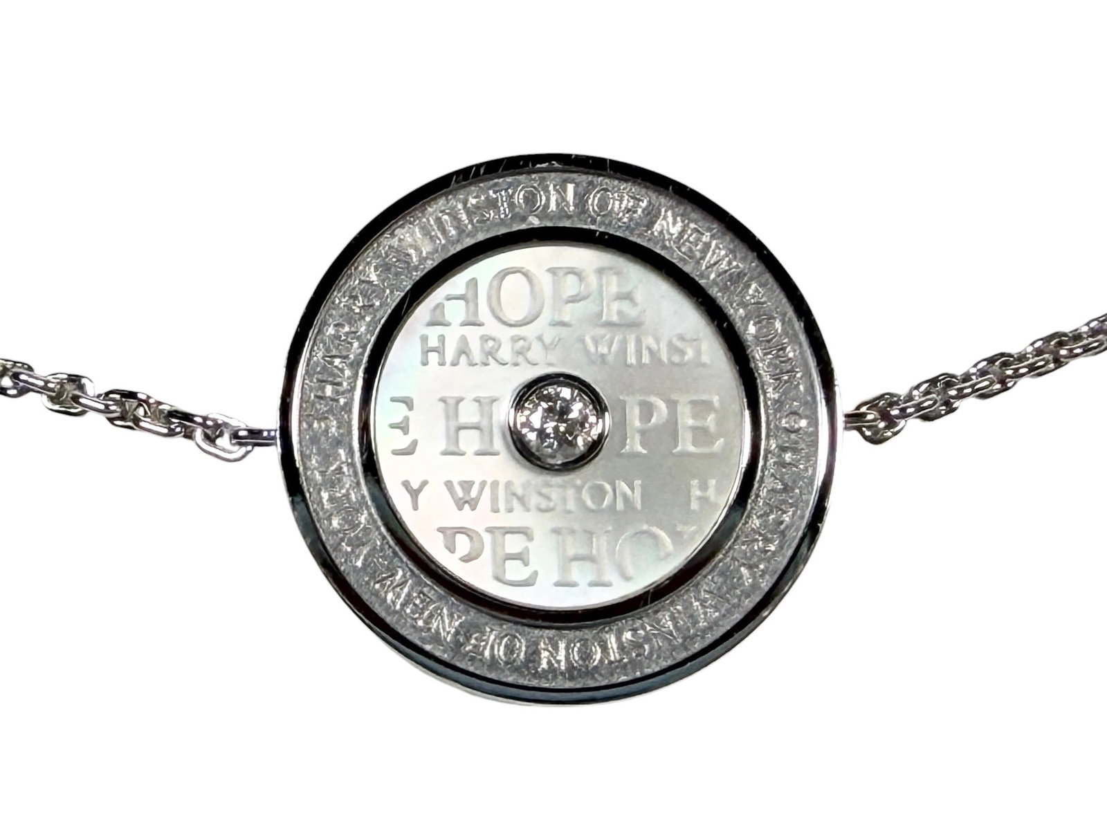 Harry Winston "Hope" 18K White Gold, Mother of Pearl, & Diamond Bracelet: Length: 7" Total Weight: 5.9g Condition: The bracelet is in very good condition. Comes in original case and box. About: Harry Winston (1896-1978) founded his New York firm in 1932 and built it around 