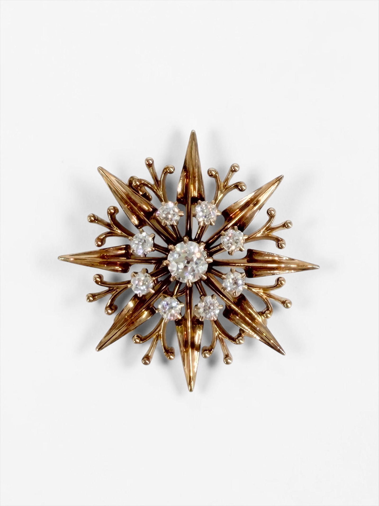 Antique 14K Gold & Diamond Pendant/Brooch: The piece can be either a necklace pendant or a brooch. Dimensions: 1" x 1 1/4" Total Weight: 7.4g Condition: In good condition. 