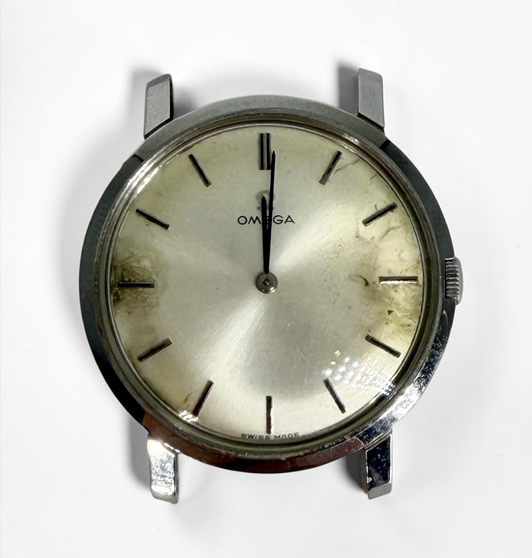 Vintage Omega Stainless Steel Watch: No Strap or Bracelet Included. Dimensions: 32mm Diameter & 15.7mm Between Lugs Total Weight: 14.5g Condition: Staining on the face. Monogrammed on the reverse. The w