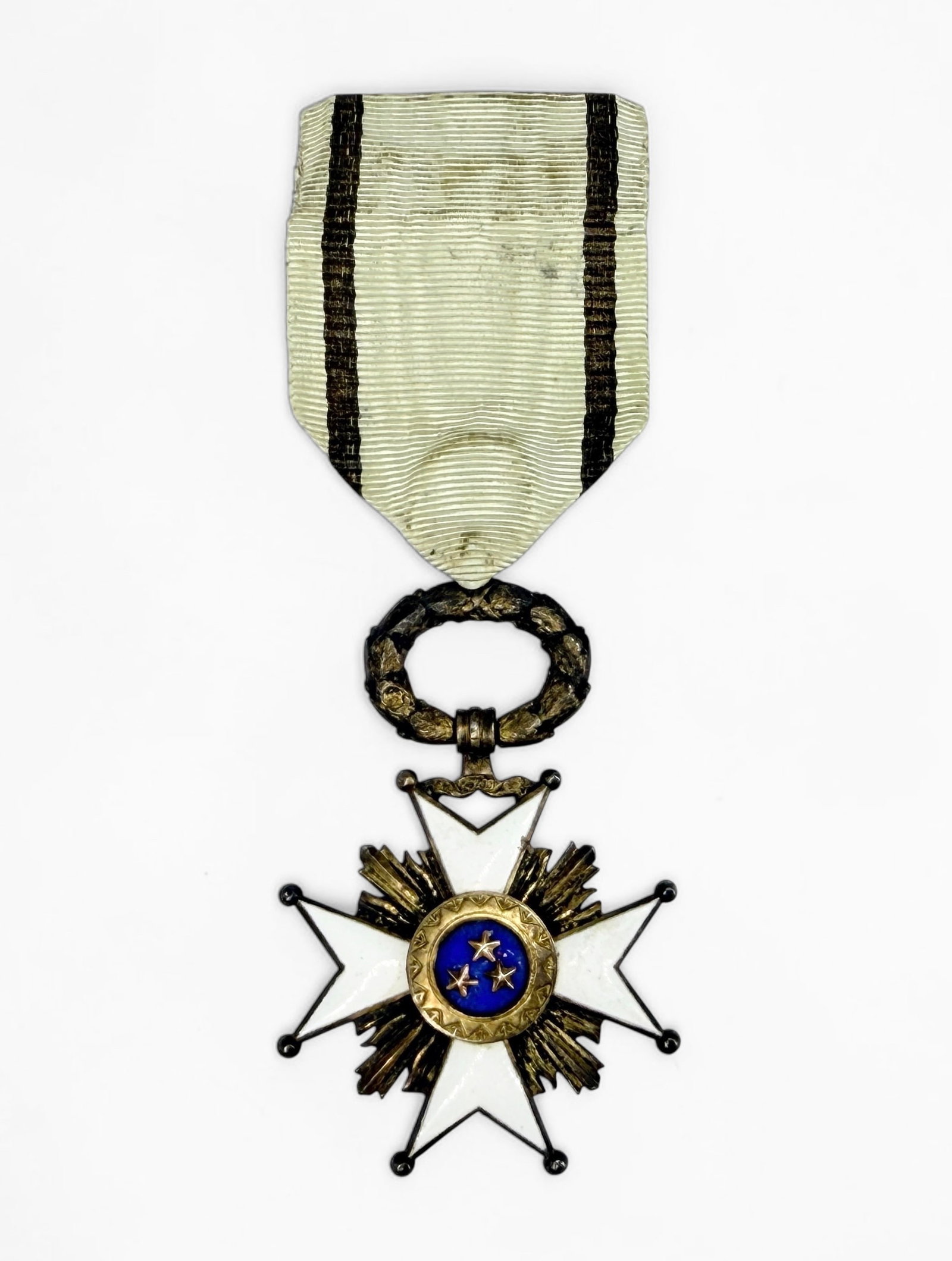 Latvian "Order Of The Three Stars" Medal: Dimensions: 4 1/2" x 1 1/2" Condition: Tarnishing to the brass elements and staining to the ribbon. See images for details.