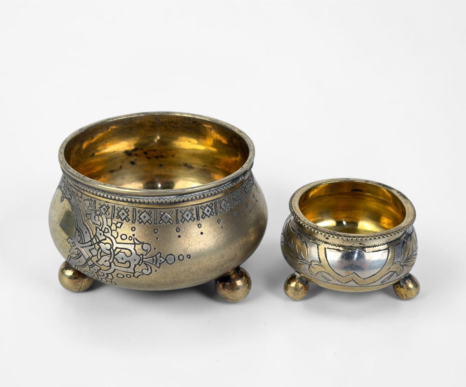 (2) Latvian .875 Silver Salt Cellars: Dimensions of Largest: 1 1/2" Tall x 2 1/2" Diameter Total Weight: 2.33ozt Condition: Minor tarnishing throughout both cellars. Otherwise, in good condition overall. 