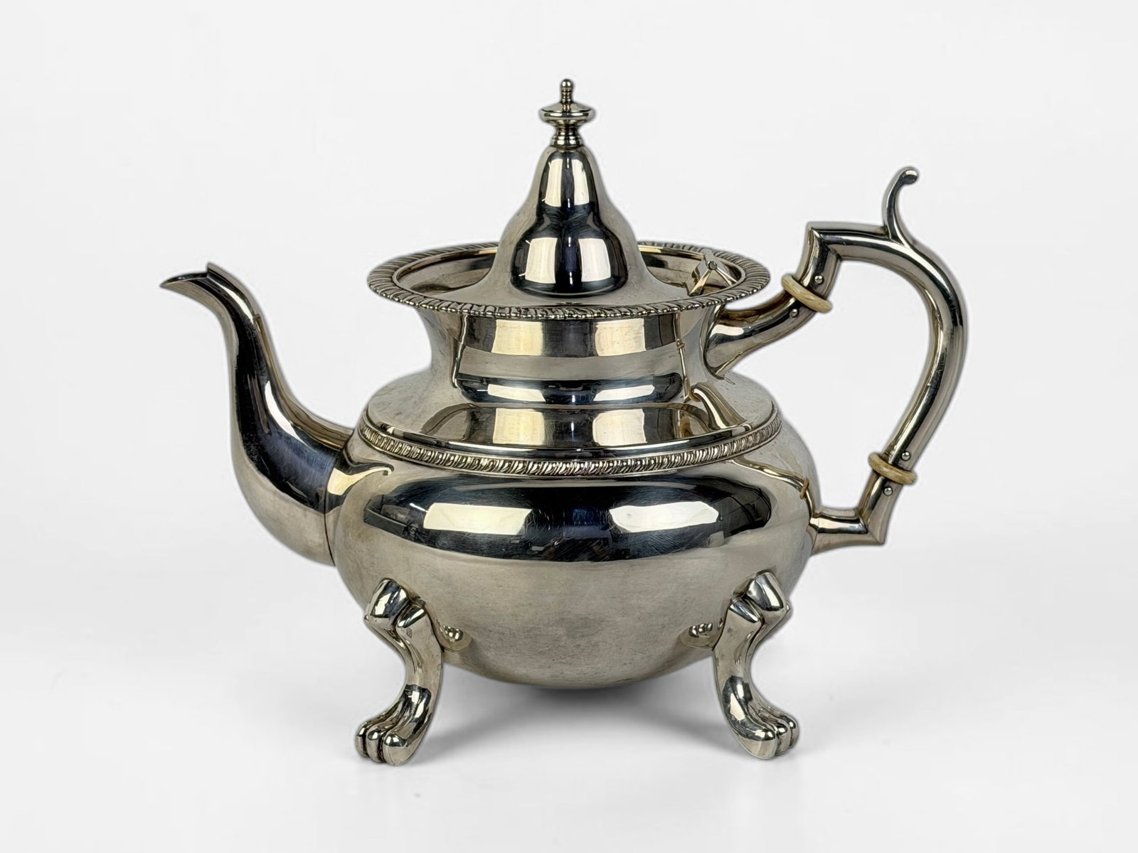 Chinese .950 Silver Teapot: Dimensions: 8" Tall x 10" Widest Point Total Weight: 26.96ozt Condition: The teapot is in very good condition. 
