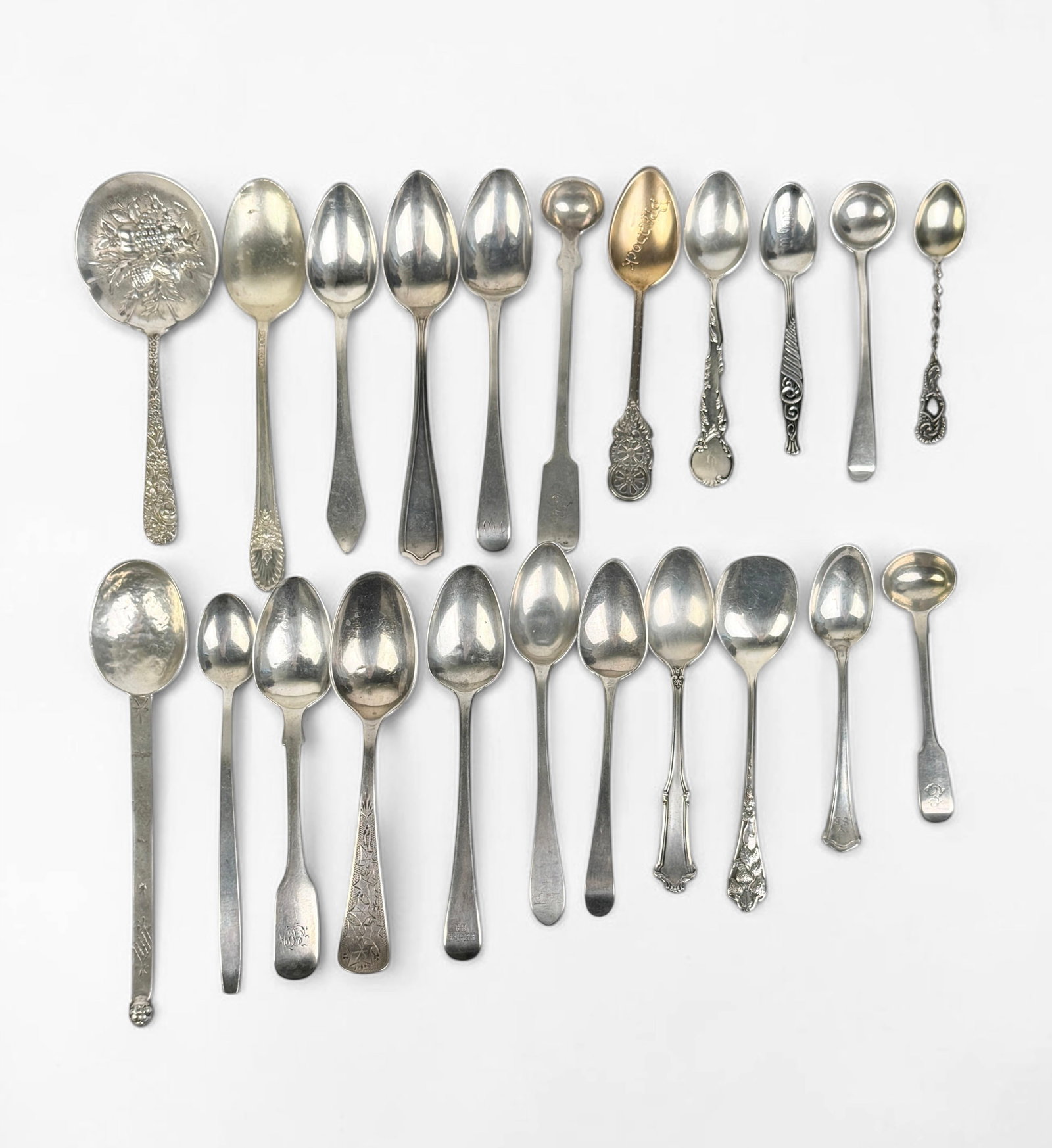 (22) Various Sterling Silver Spoons: Longest Spoon: 6 1/2" Total Weight: 10.6ozt Condition: Minor tarnishing to the spoons. Some are monogrammed. Overall, the set is in good condition. See images for