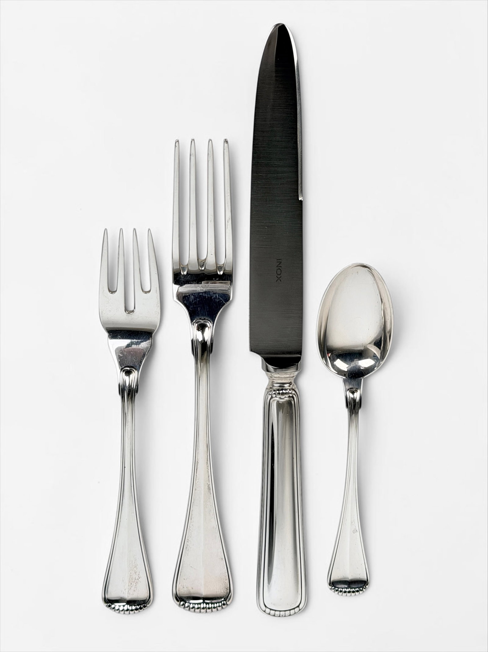 (17pc) Buccellati "Milano" Sterling Flatware Set: Lot Includes: (4) Dinner Knives - 10" Long (4) Dinner Forks - 8" Long (4) Salad Forks - 7" Long (4) Spoons - 6" Long (1) Serving Spoon - 10 1/2" Long Total Weight: 24.2ozt PLUS (4) Sterling Handled