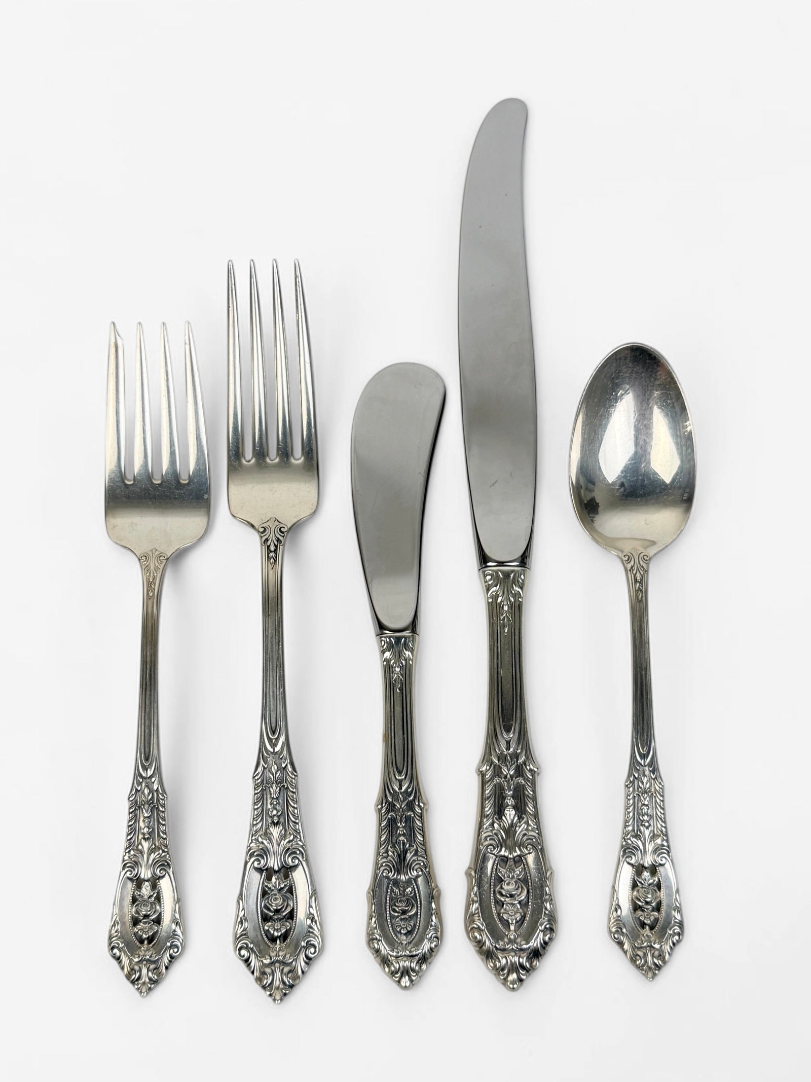 (42pc) Wallace "Rose Point" Sterling Flatware Set: Set Includes: 8 Dinner Knives (9" Long) 8 Butter Knives (6" Long) 8 Dinner Forks (7" Long) 8 Salad Forks (6 1/2" Long) 8 Spoons (6" Long) 1 Cheese Knife (7" Long) 1 Cake Breaker (11" Long) T