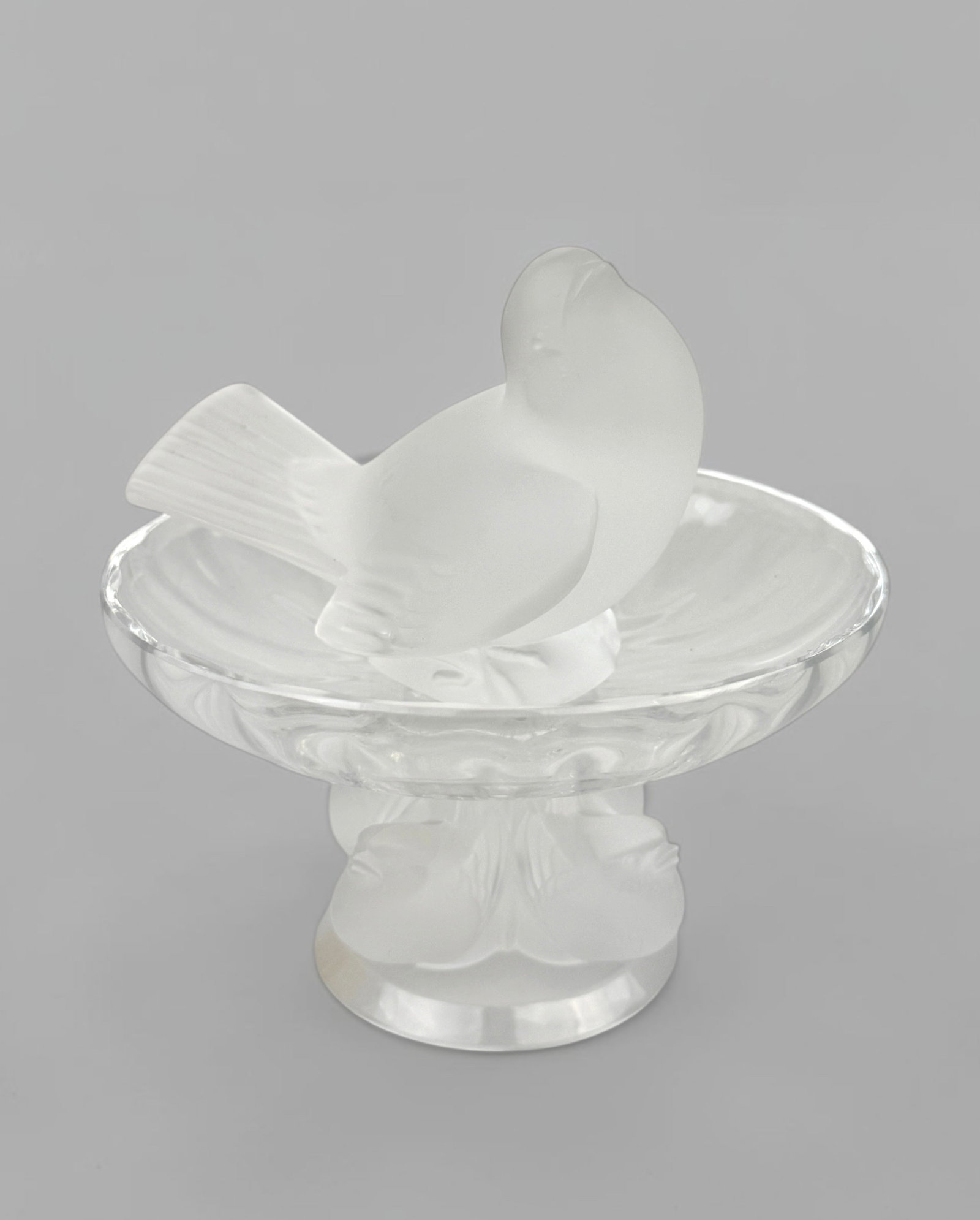 Lalique Bird Dish & Figure: Both items are signed on the bottom. Dimensions of Dish: 3 1/4" Tall x 5 1/2" Diameter Condition: Both items are in very good condition. See images for details. Ab