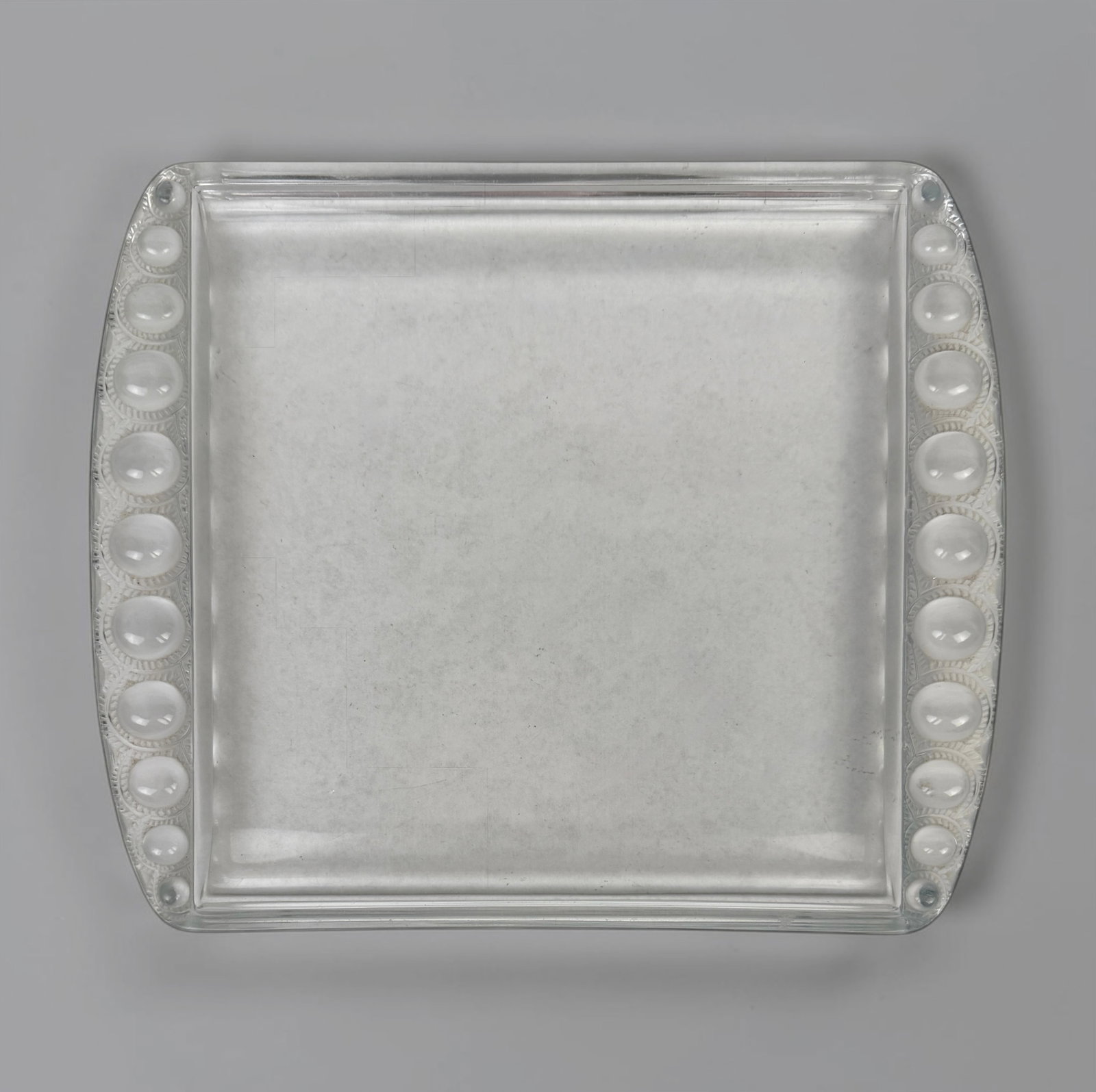Lalique "Ermitage" Glass Tray: Dimensions: 10" x 8 1/2" Condition: The glass dish is in very good condition. About: Rene Lalique (1860–1945) was the leading Art Nouveau jeweler in Paris
