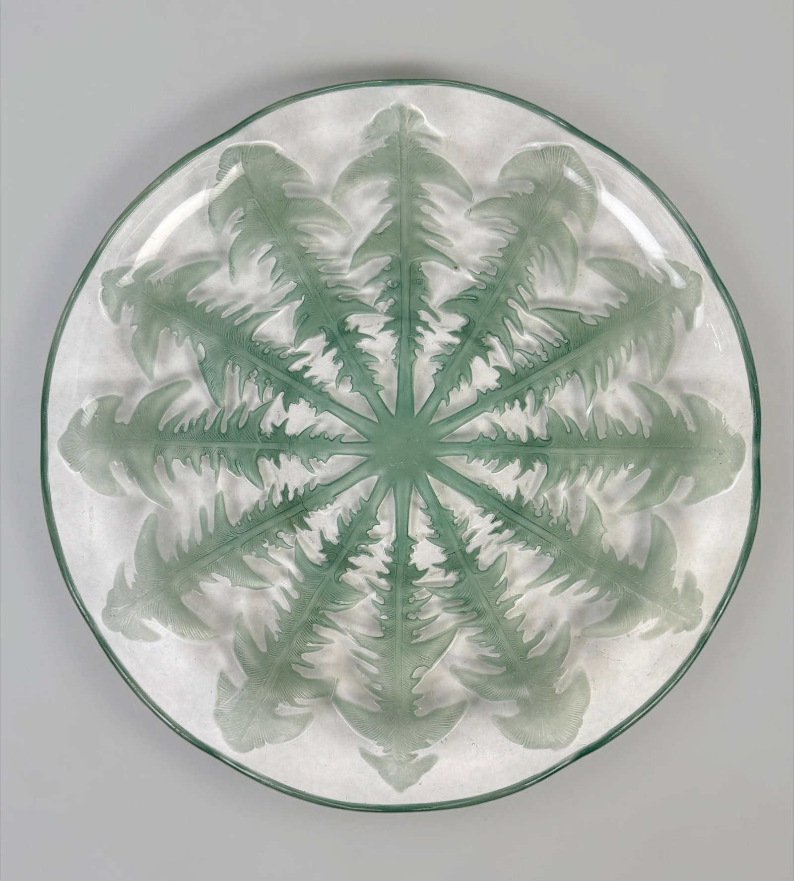 R. Lalique "Dandelion" Glass Tray: Stamped Lalique in the center. Dimensions: 12 1/2" Diameter Condition: The platter is in good condition. About: Rene Lalique (1860–1945) was the