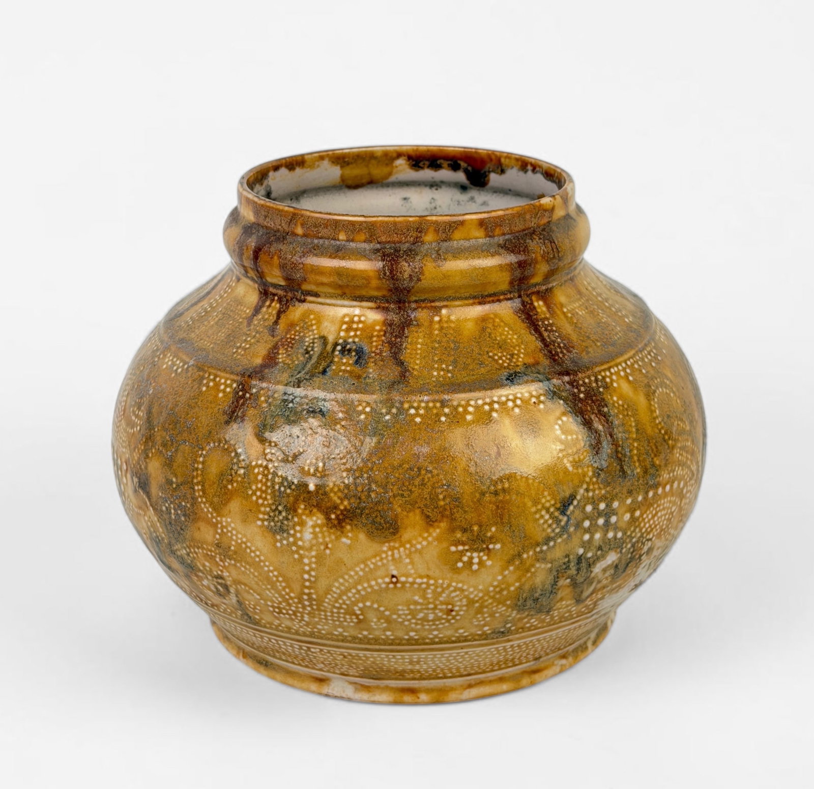 Tiffany Studios LCT Pottery 'Lion' Vase: Signed on the bottom. The pot features a lion motif. Dimensions: 6 1/2" Tall x 8" Diameter Condition: There is a crack to the bottom of the pot. The glazing makes t