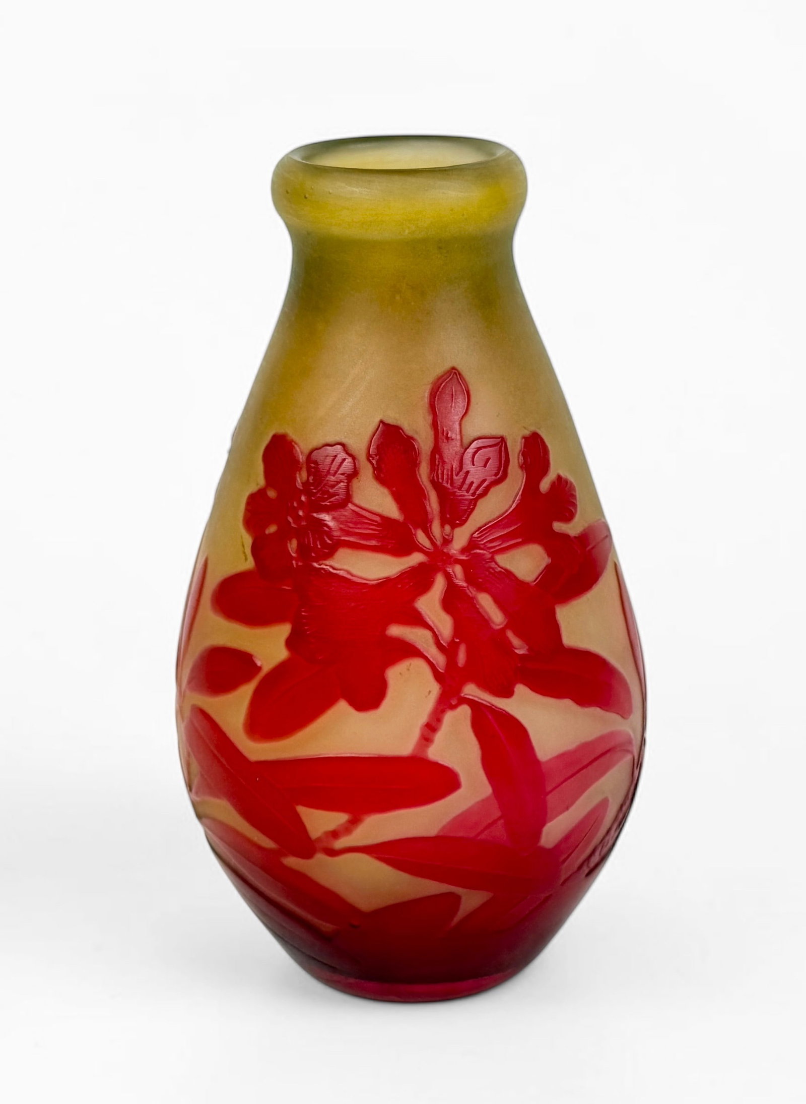 Emile Galle 'Red Plum Blossom' Art Nouveau Cameo Vase: Signed by the artist along the lower edge. Dimensions: 4 3/4" Tall x 2 1/2" Widest Point Condition: There is a 1/2" scratch to the red glass along the bottom edge ne