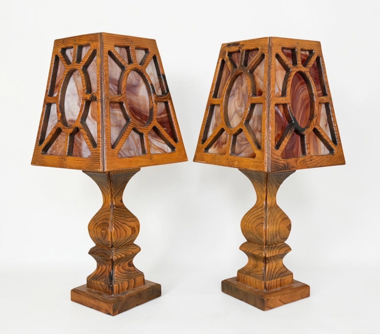 Pair of Arts & Crafts Table Lamps W/ Slag Glass: Dimensions: 32" Tall Condition: Surface scratches and wear to the lamps. The slag glass is in good condition. Both lamps light up when plugged in. The wiring should be inspected prio