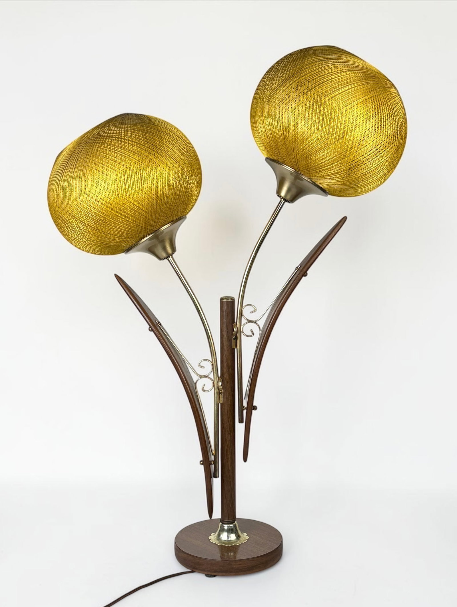 2-Light Mid Century Modern Table Lamp: Dimensions: approx. 34" Tall x 24" Wide Condition: The shorter light is wobbly, but still securely attached to the base. The light turns on when plugged in. Wiring should be inspected