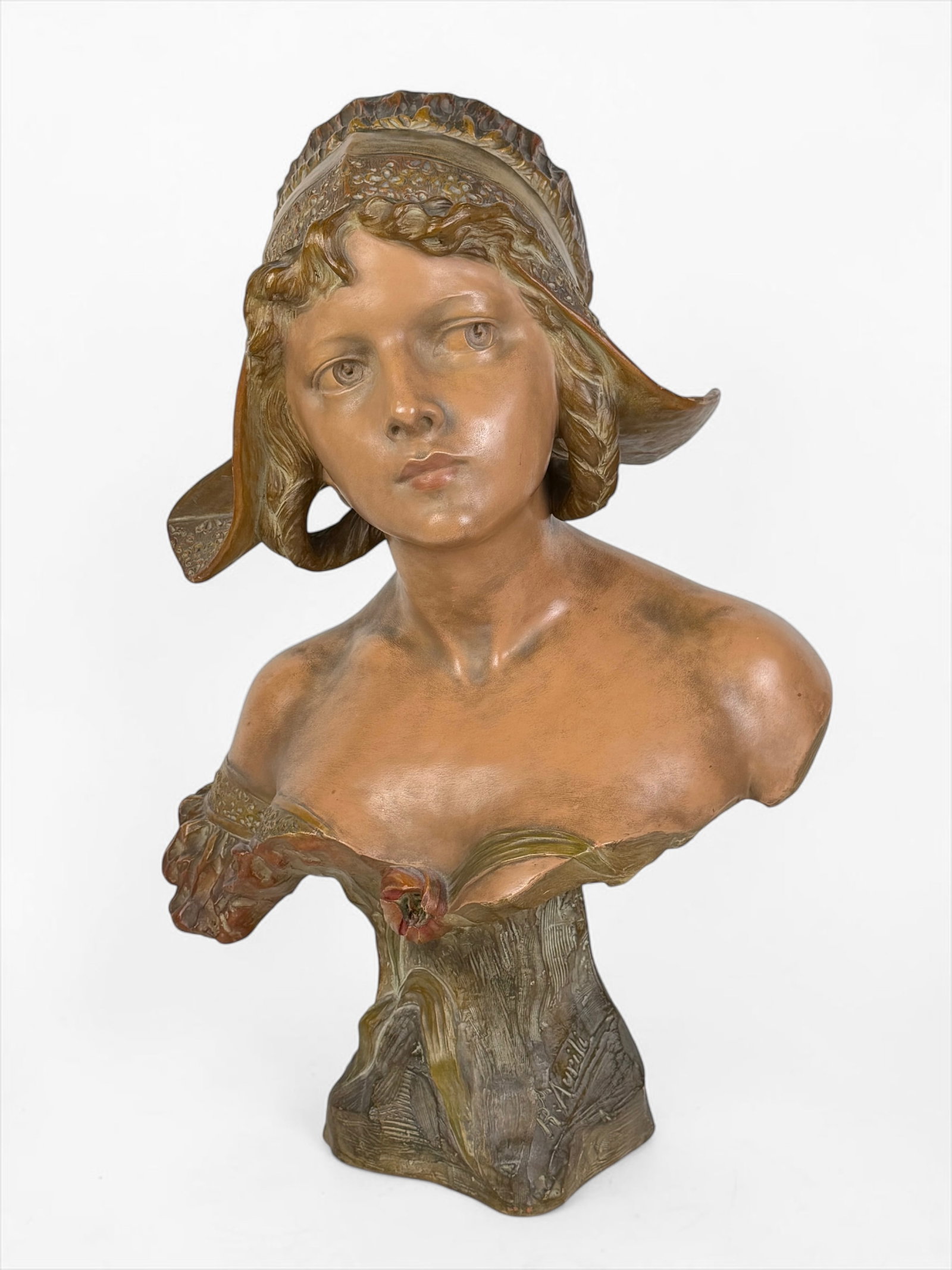 Richard Aurili 'Bust of a Woman' Polychrome Terracotta: Signed by the artist on the base. Dimensions: 24" x 14" x 9" Condition: Minor loss of pigment on the shoulders. Otherwise, the sculpture is in good condition.