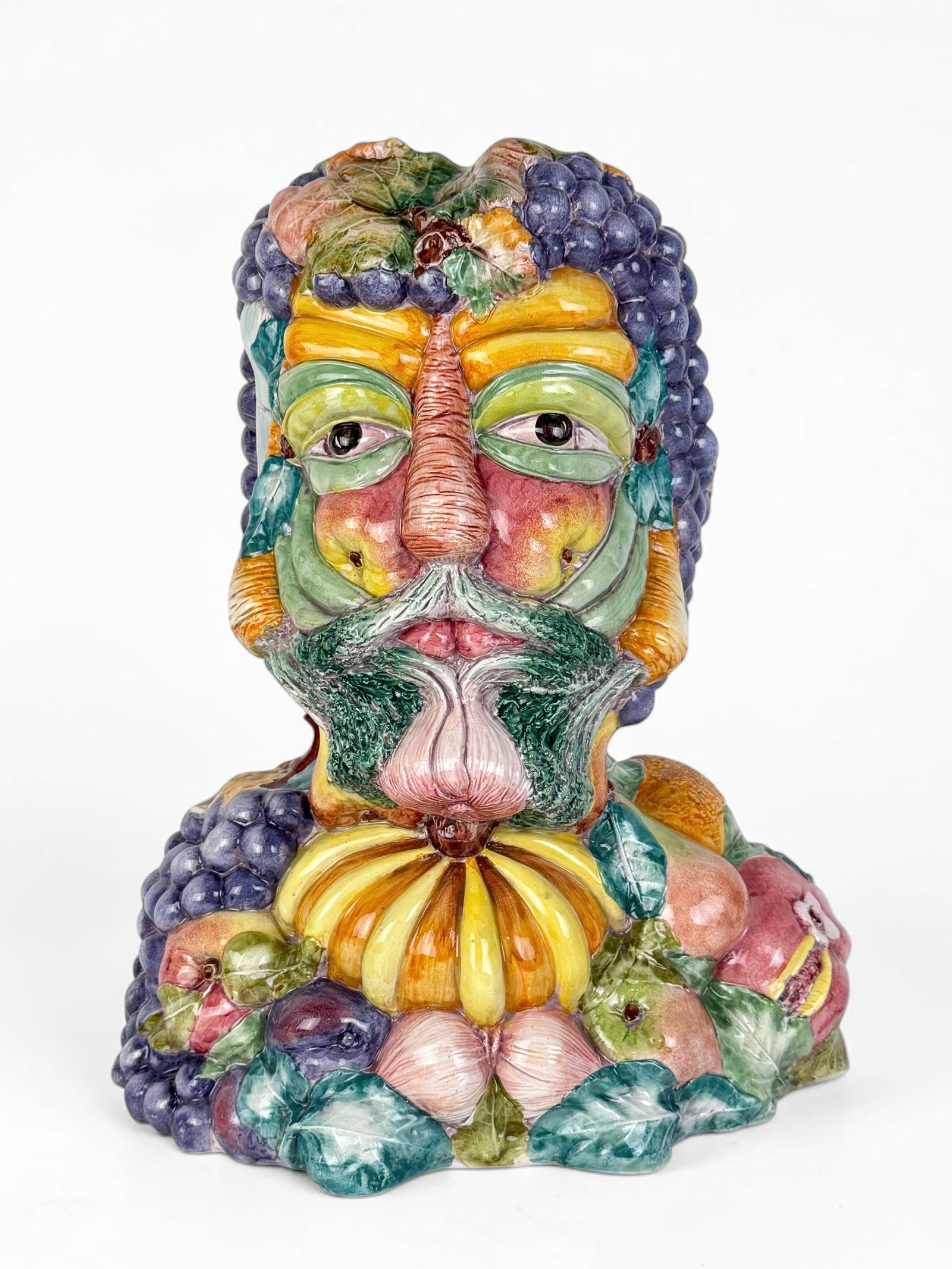 After Giuseppe Arcimboldo Italian Ceramic Bust: Stamped in the hollow interior. Likely produced in the 1980s. Dimensions: 18" x 14" x 9" Condition: The bust is in very good condition. See images for