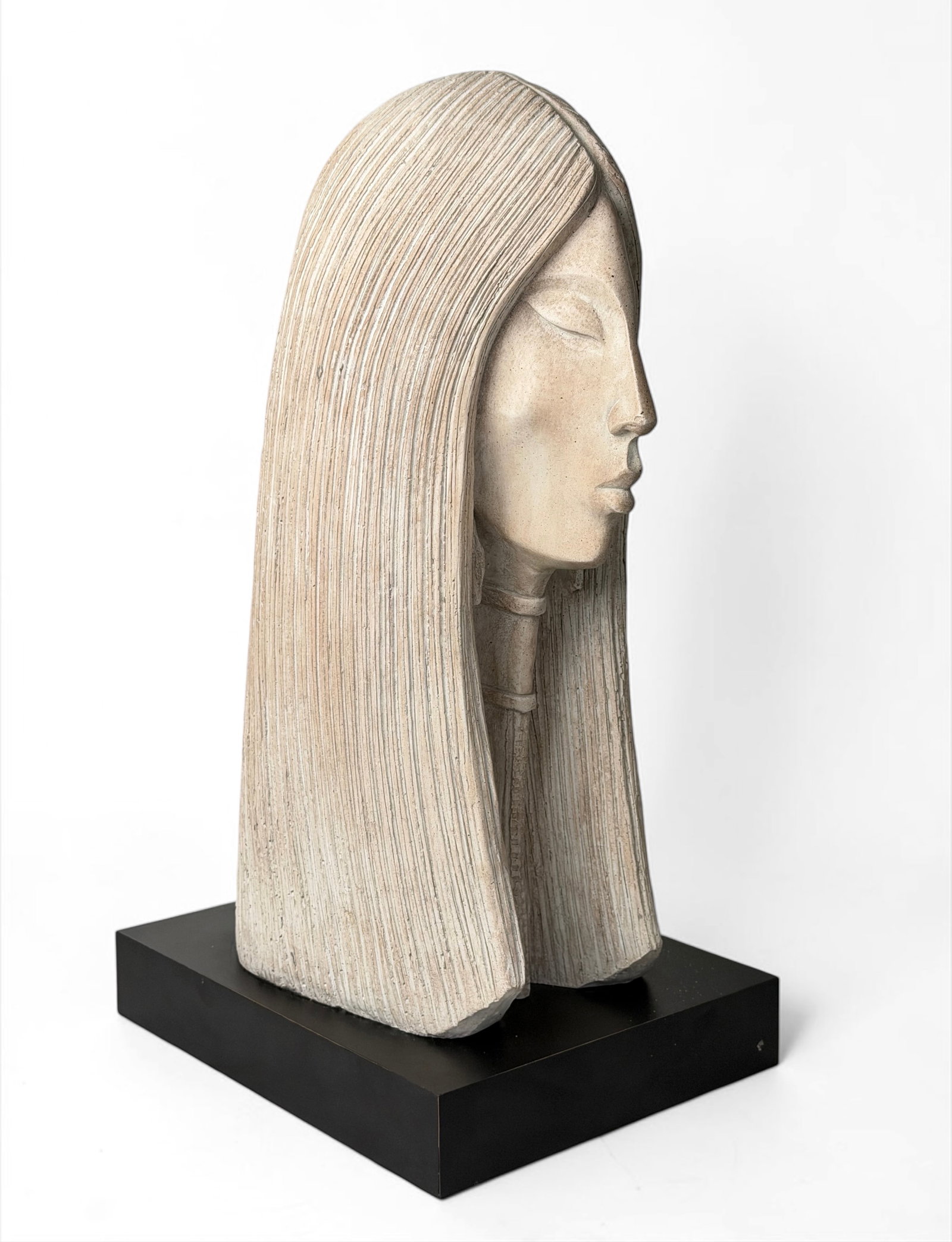 David Fisher "Acoma" Bust of a Woman: Artist: David Fisher Produced by Austin Productions Date: 1986 Marked on the back of the bust. Dimensions: 21" Tall x 9 1/2" Wide x 12 1/2" Deep Condition: