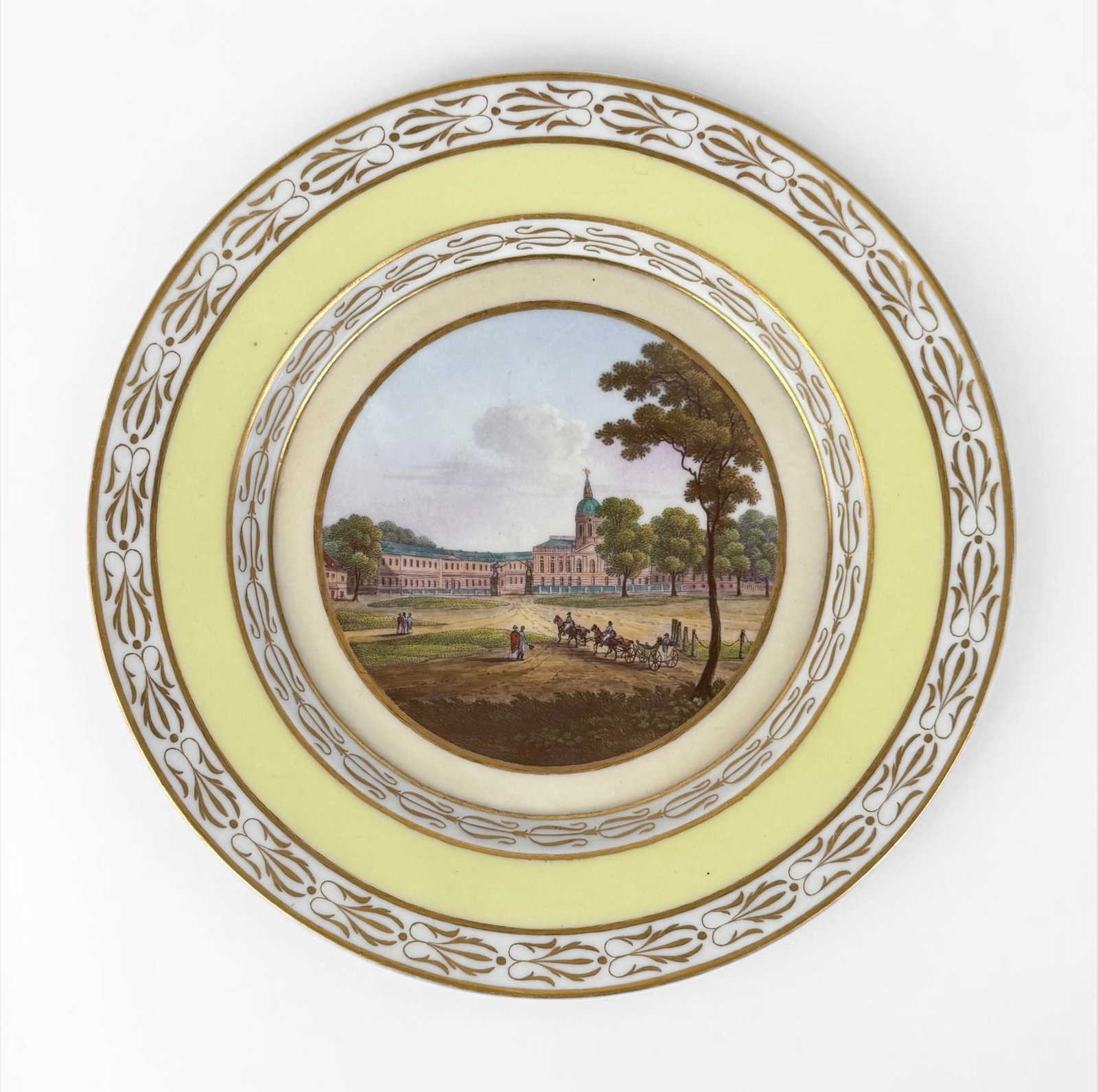 19th Century KPM Style Charlottenburg Plate: Stamped and inscribed on back. Dimensions: Approx. 9 1/2" Diameter Condition: Minor wear and markings throughout, consistent with the porcelain's age. 